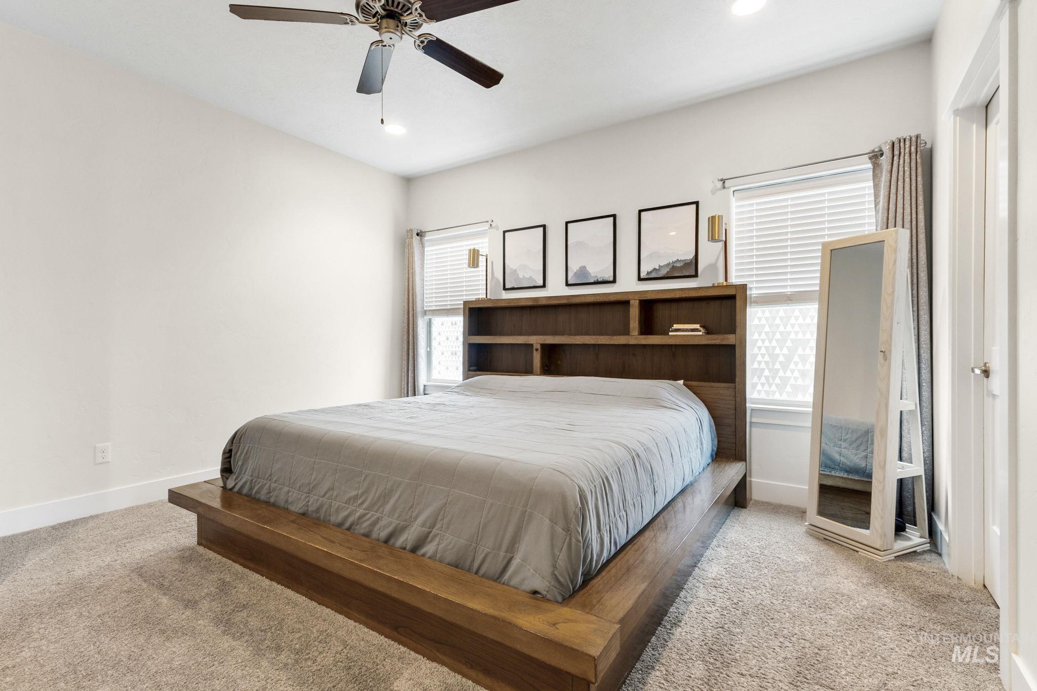 18293 North Streams Edge Way Boise, ID 83714 - Photo 18 of 50 Bedroom with carpet flooring and ceiling fan