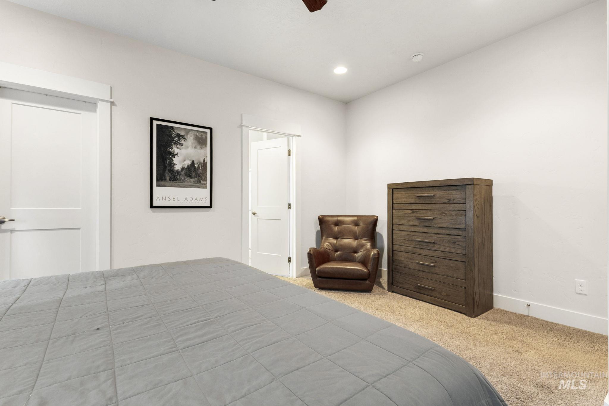 18293 North Streams Edge Way Boise, ID 83714 - Photo 19 of 50 Carpeted bedroom featuring ceiling fan and recessed lighting