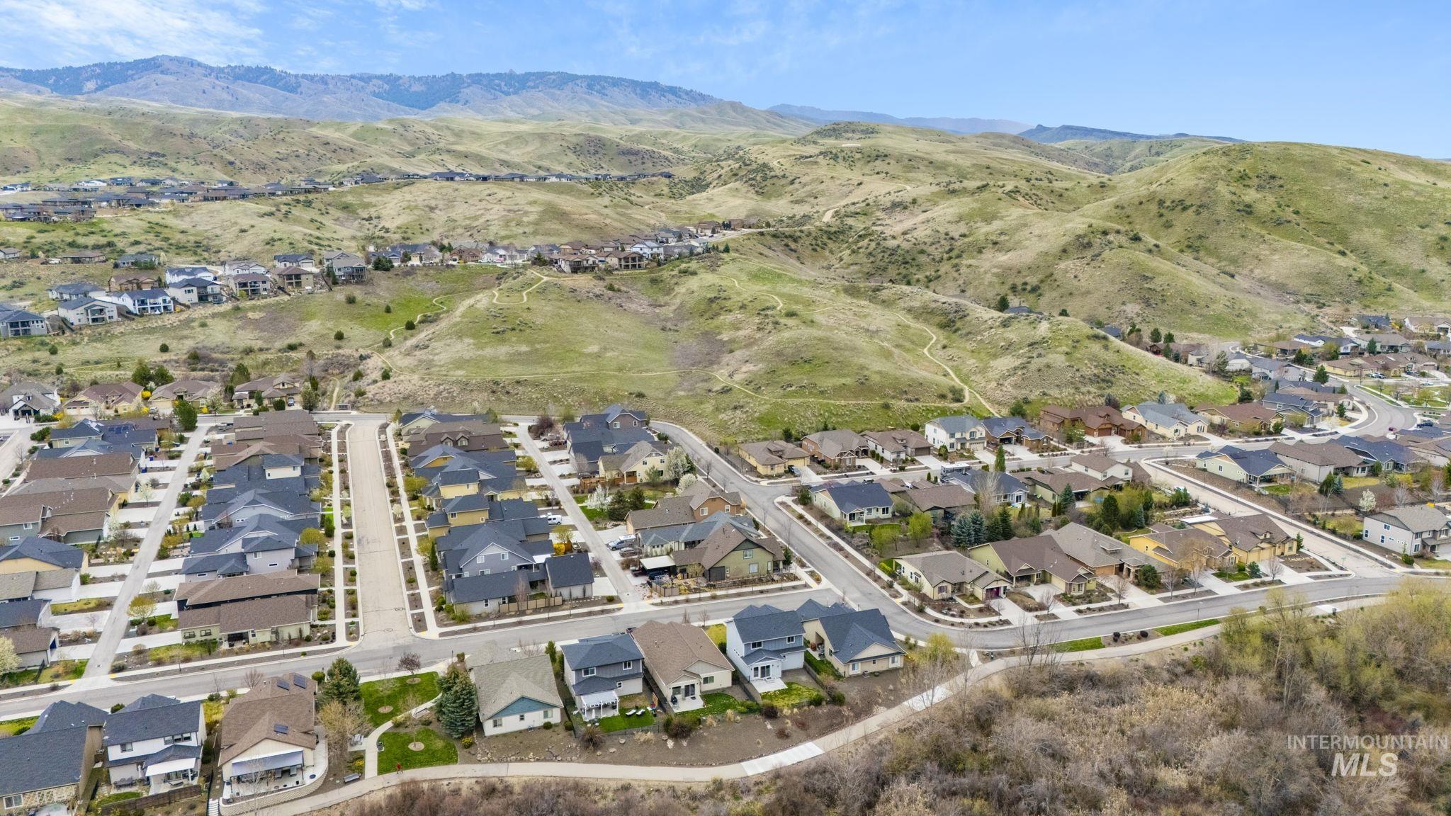 18293 North Streams Edge Way Boise, ID 83714 - Photo 47 of 50 Aerial view of residential area with mountains