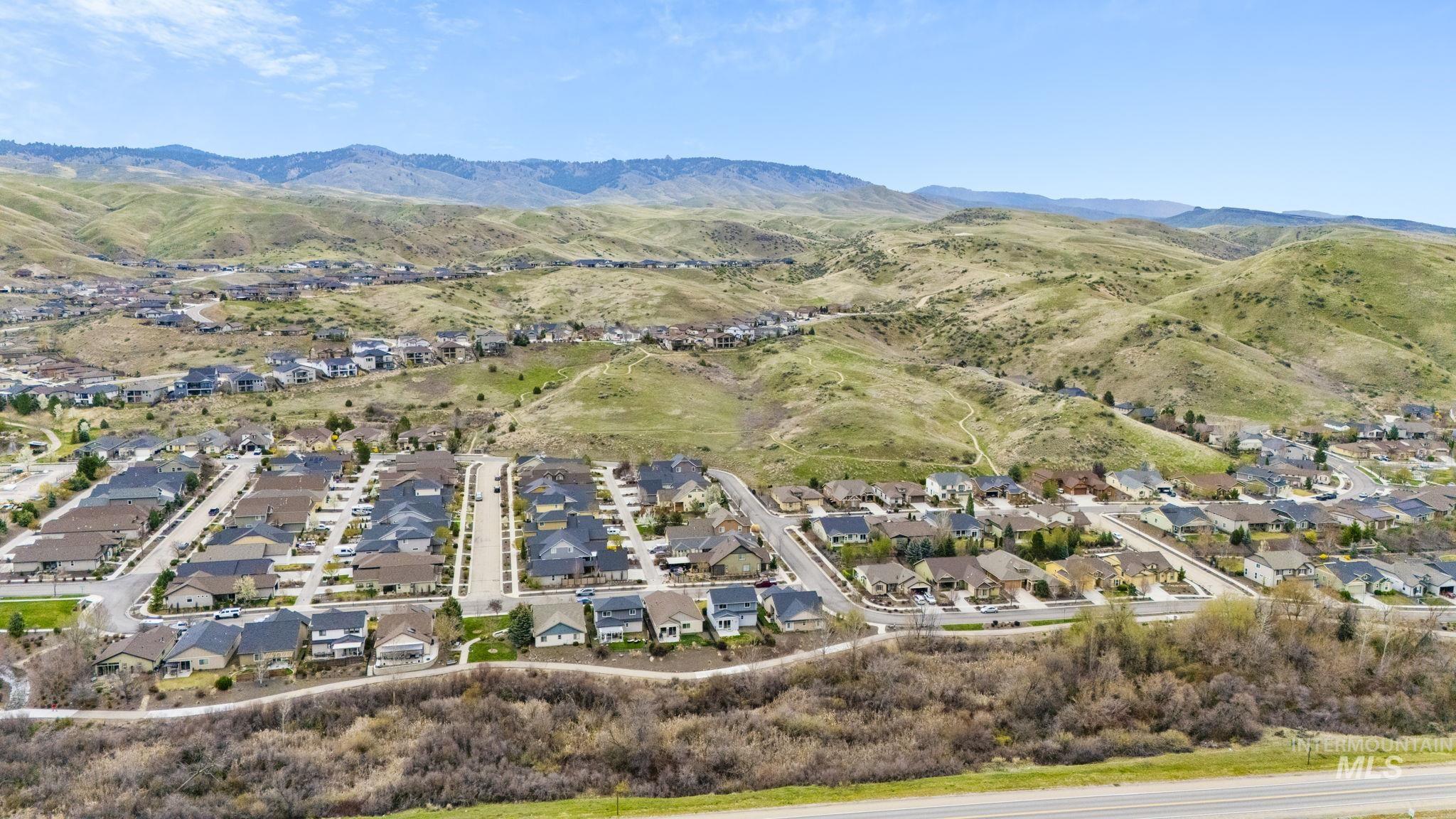 18293 North Streams Edge Way Boise, ID 83714 - Photo 48 of 50 Aerial perspective of suburban area featuring a mountainous background
