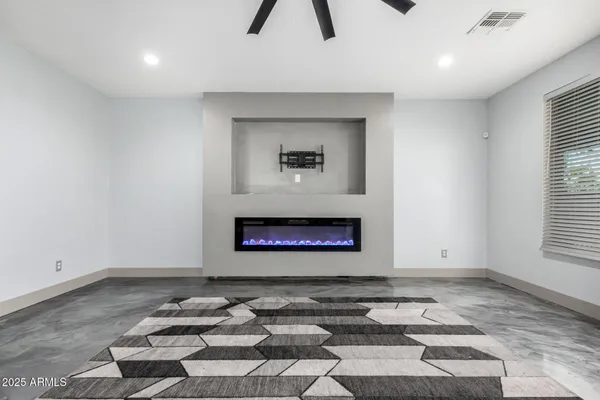 an empty room with windows