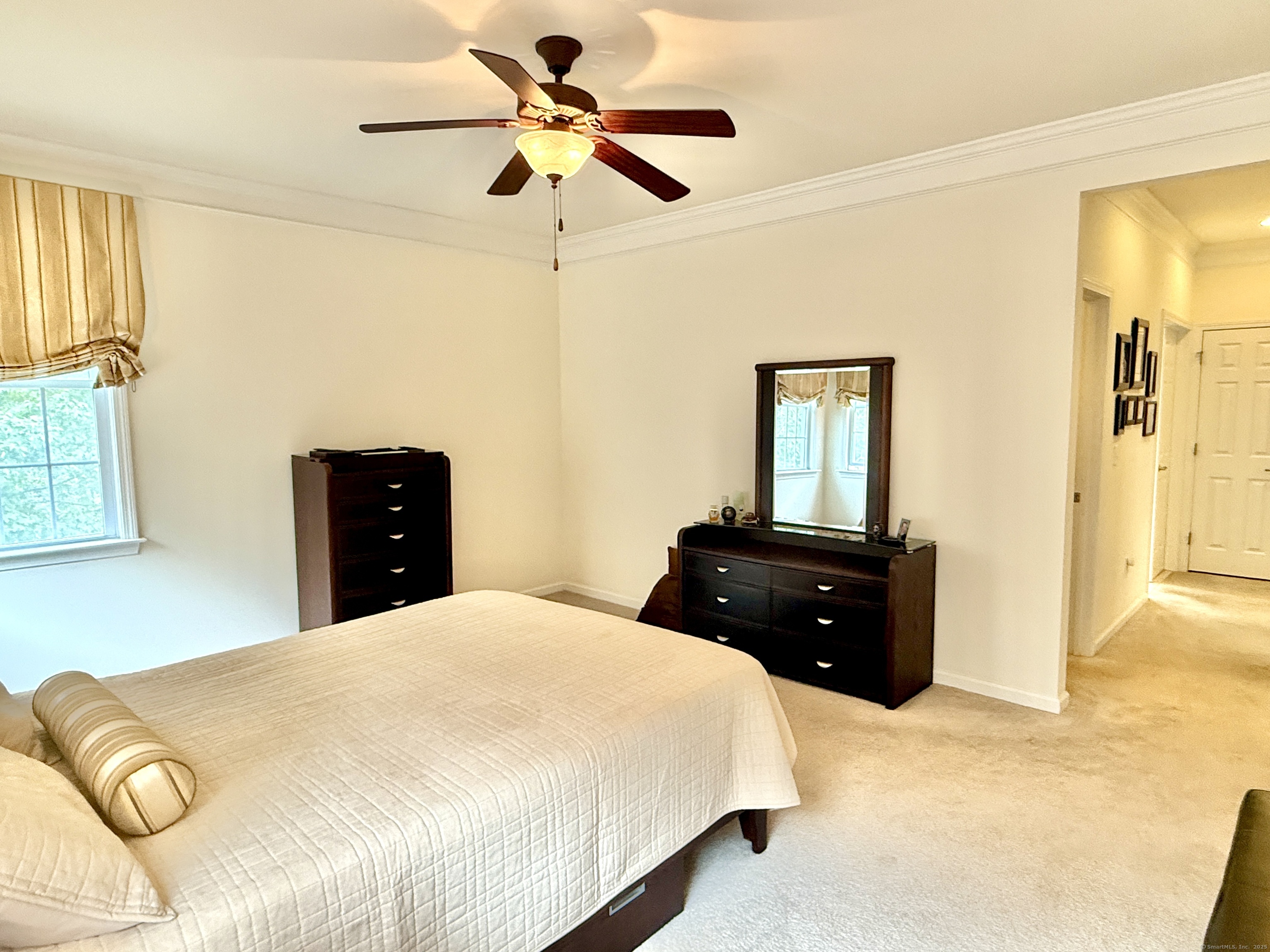 18 Fieldstone Lane, Unit 18 Beacon Falls, CT 06403 - Photo 15 of 40 a bedroom with a bed and a dresser