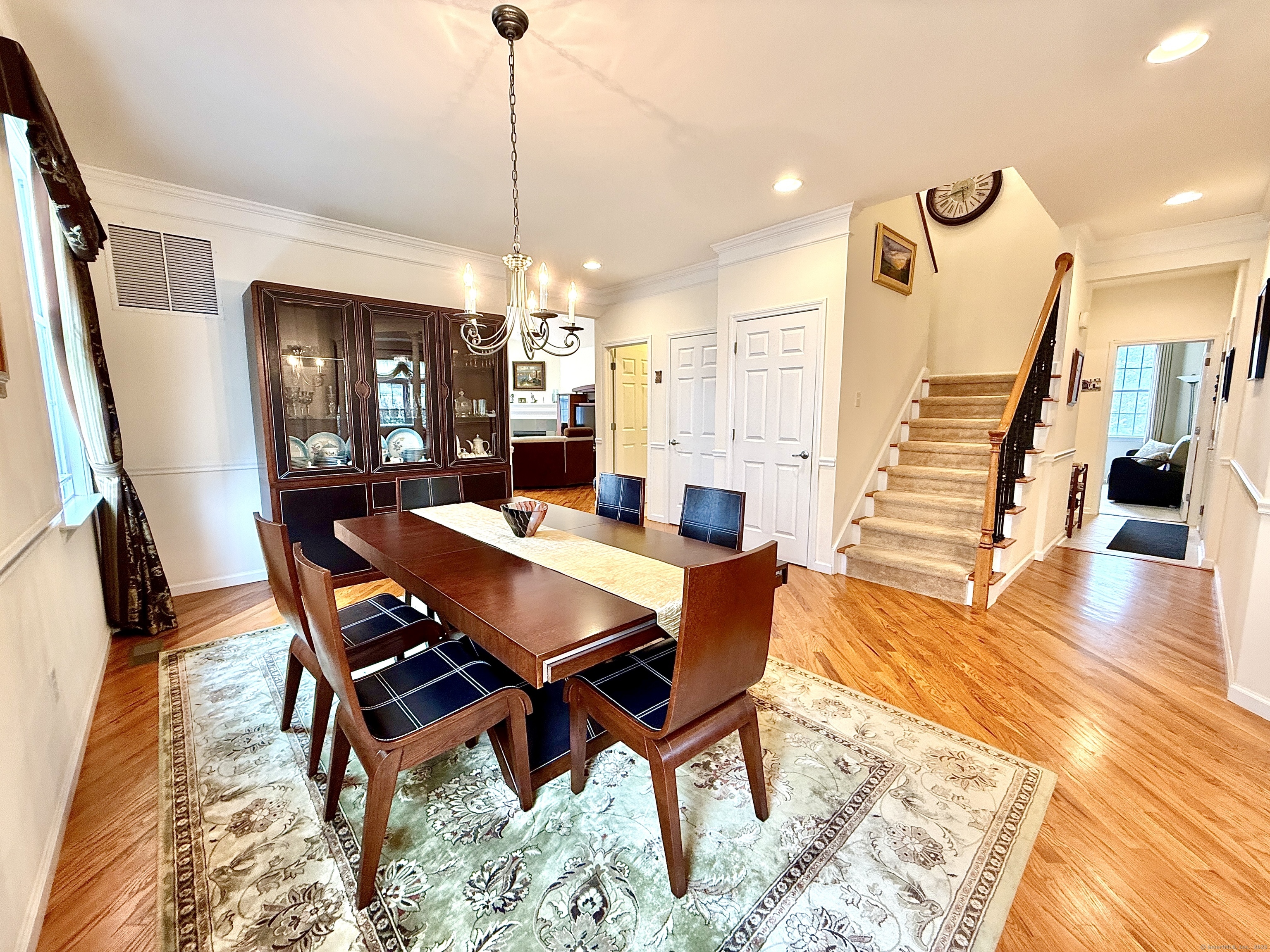 18 Fieldstone Lane, Unit 18 Beacon Falls, CT 06403 - Photo 20 of 40 a dining room with furniture window and wooden floor