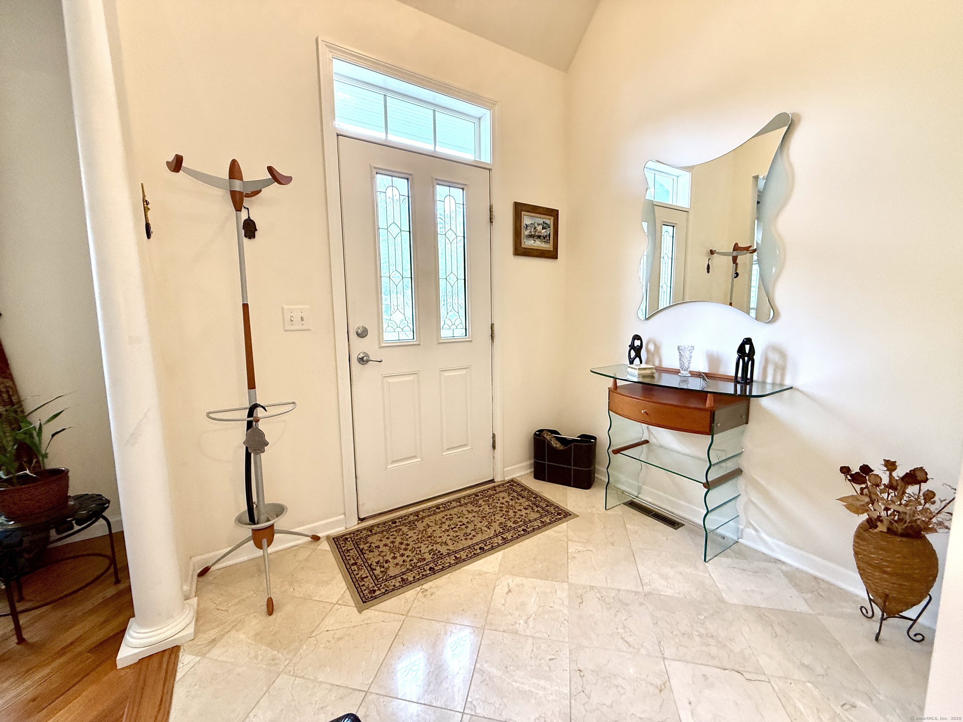 18 Fieldstone Lane, Unit 18 Beacon Falls, CT 06403 - Photo 2 of 40 a bedroom with a bed and a mirror