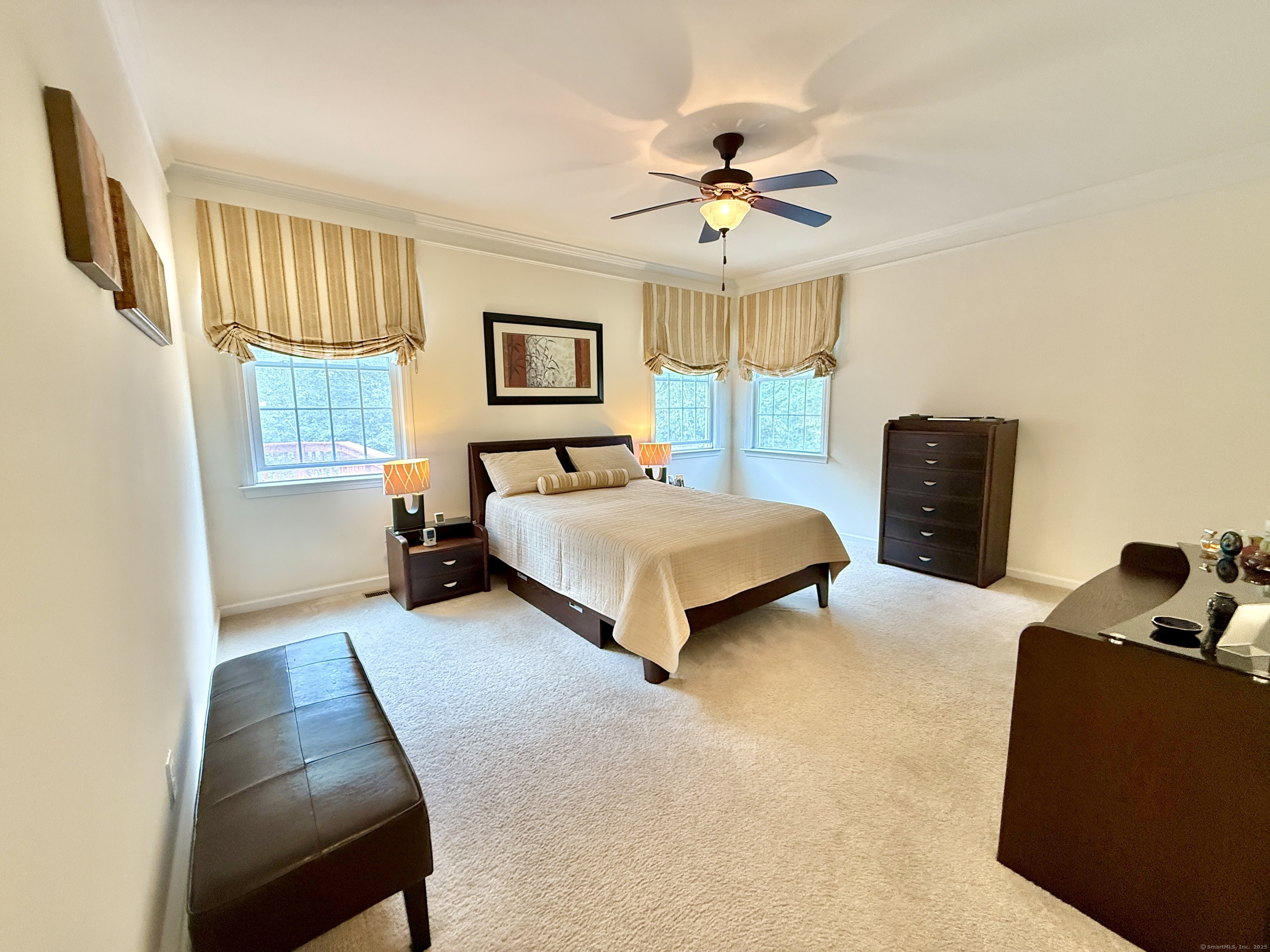 18 Fieldstone Lane, Unit 18 Beacon Falls, CT 06403 - Photo 22 of 40 a bedroom with a bed and a couch