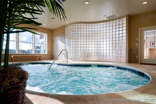 18 Fieldstone Lane, Unit 18 Beacon Falls, CT 06403 - Photo 24 of 40 a view of a living room and window