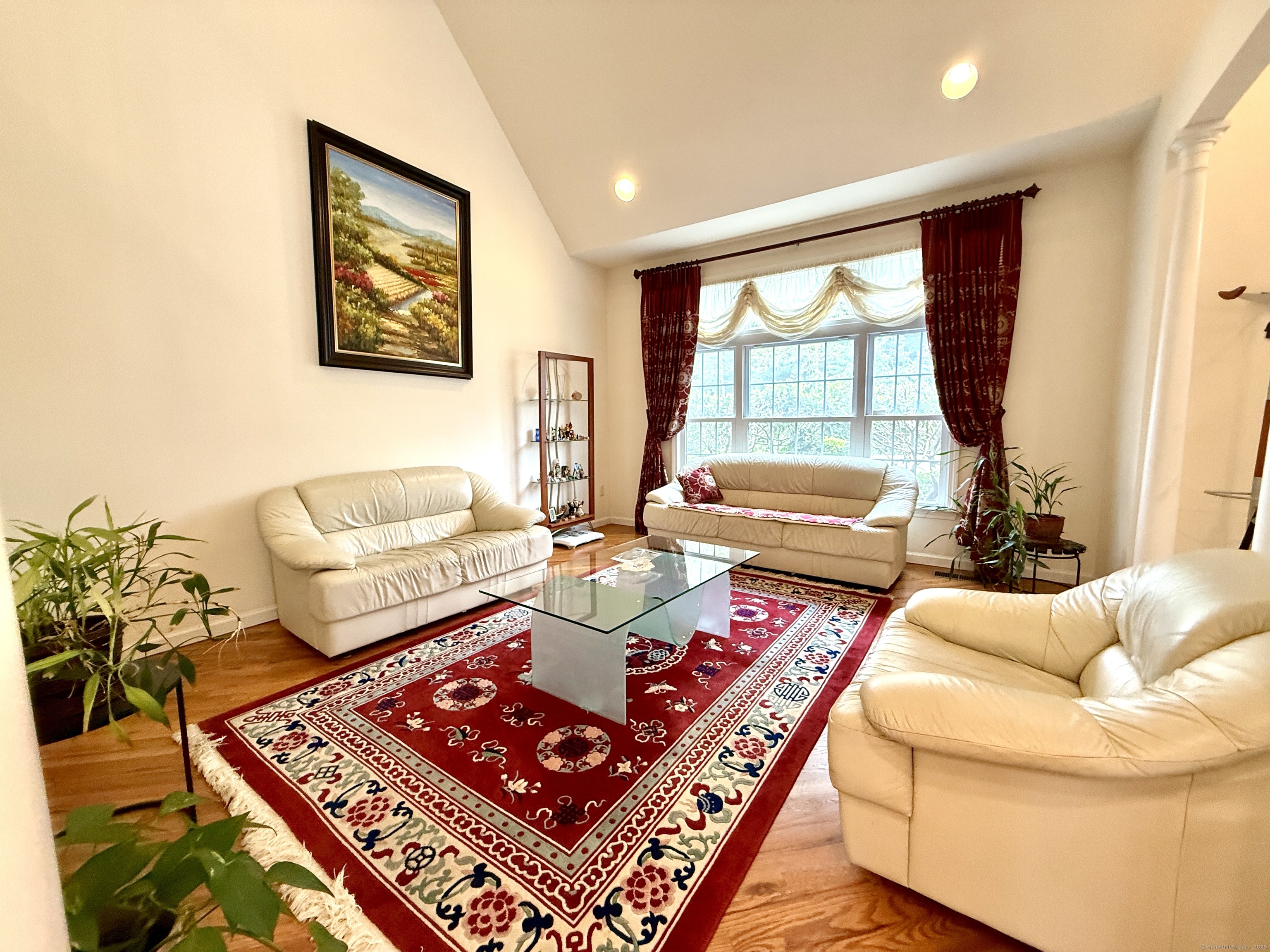 18 Fieldstone Lane, Unit 18 Beacon Falls, CT 06403 - Photo 28 of 40 a living room with furniture and a large window