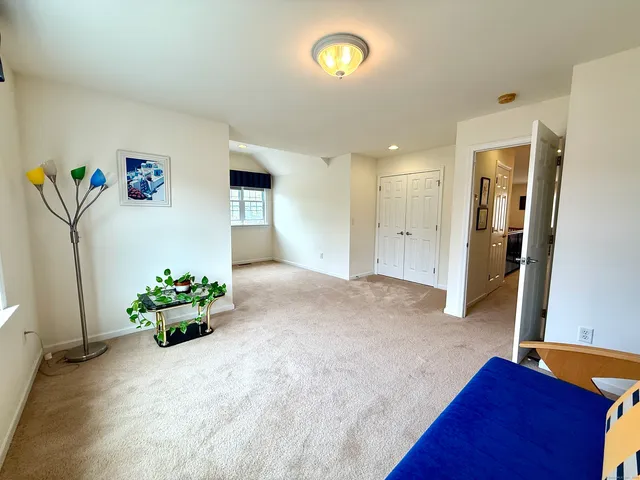 a view of livingroom with furniture and toys