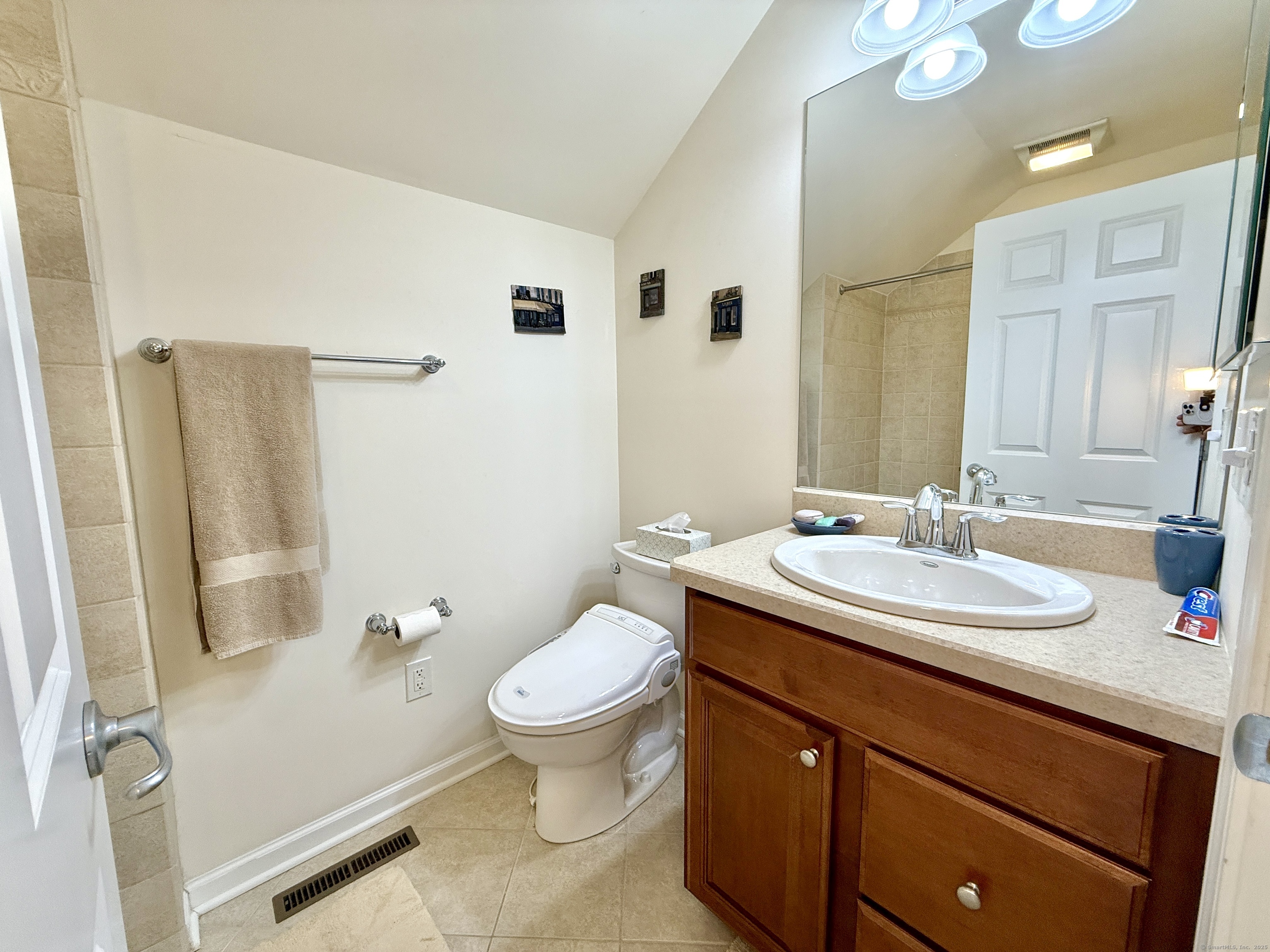 18 Fieldstone Lane, Unit 18 Beacon Falls, CT 06403 - Photo 34 of 40 a bathroom with a sink toilet and shower