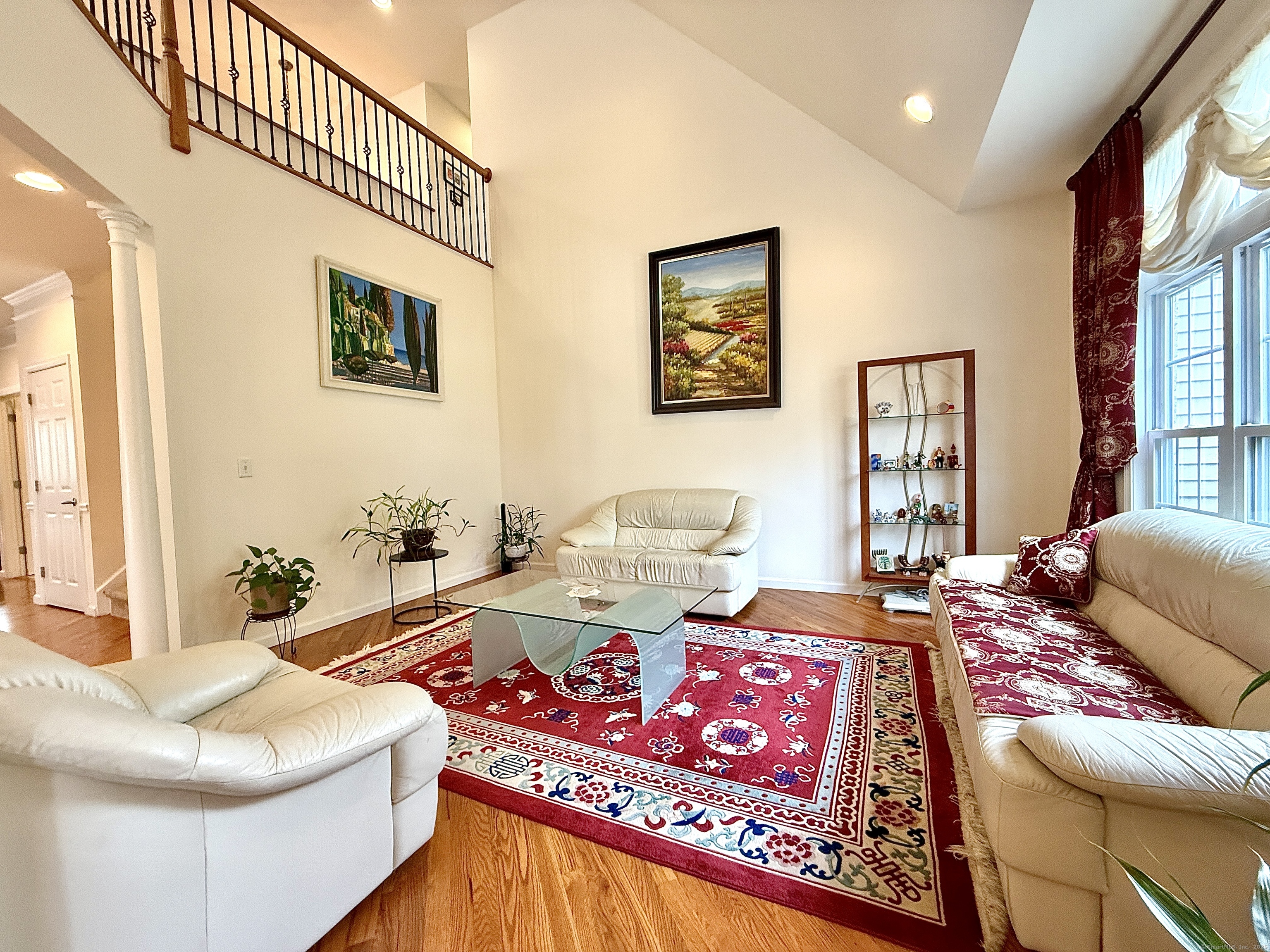 18 Fieldstone Lane, Unit 18 Beacon Falls, CT 06403 - Photo 7 of 40 a living room with furniture and a table