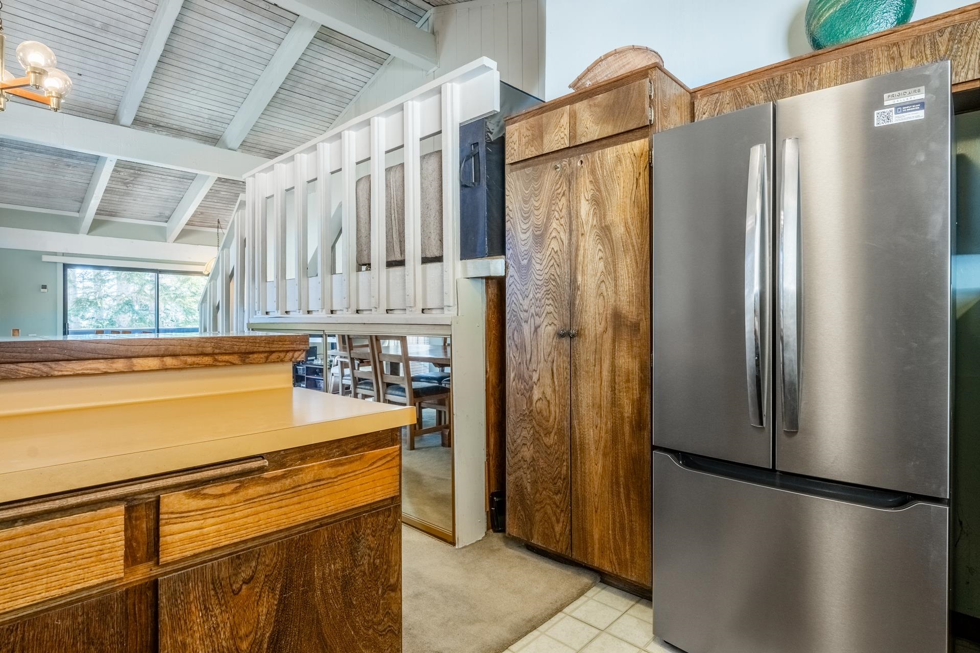 94 John Muir Road, Unit 132 Mammoth Lakes, CA 93546 - Photo 19 of 58 a kitchen with stainless steel appliances granite countertop a refrigerator and a stove