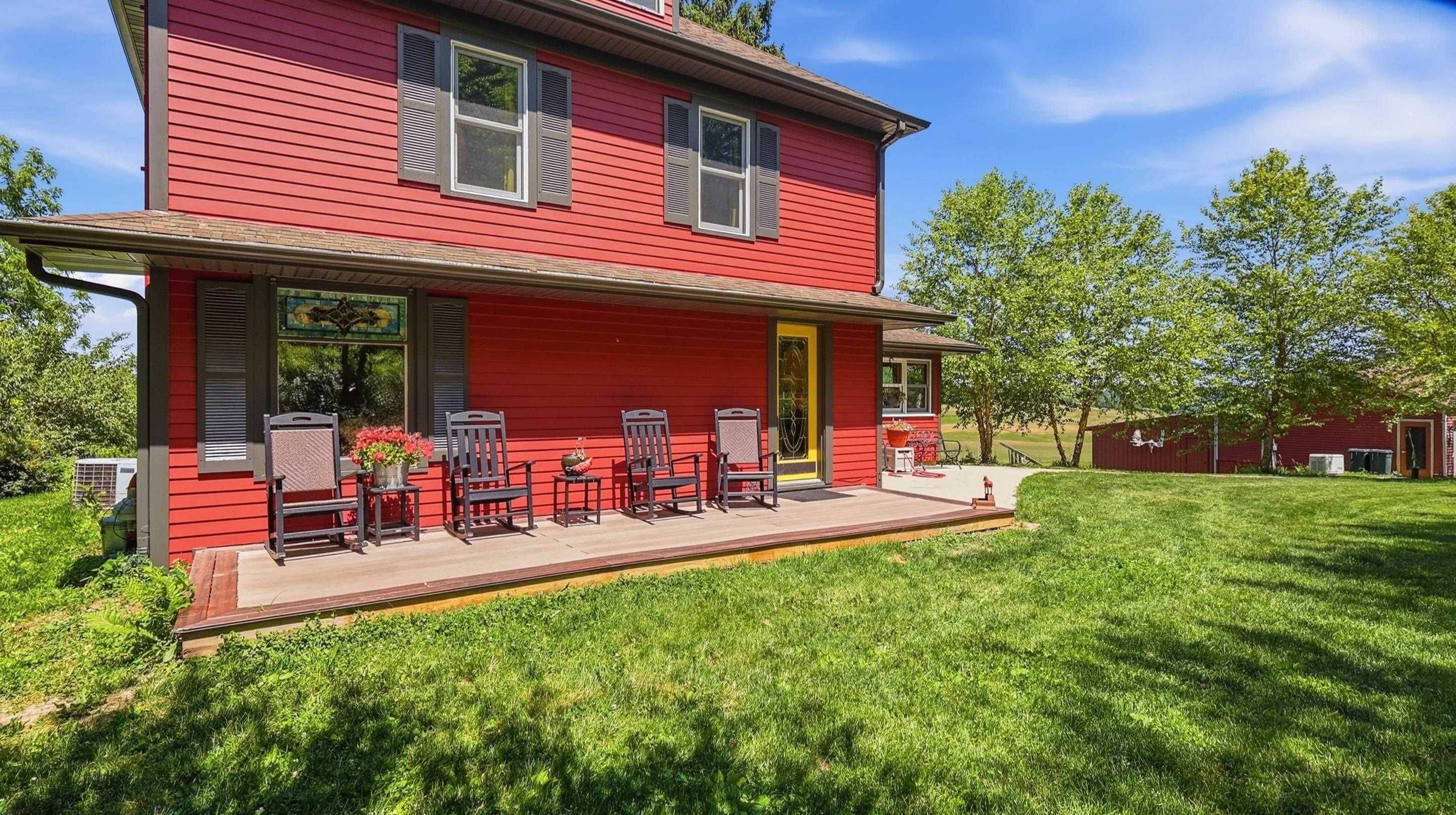 2181 South Irish Hollow Road Galena, IL 61036 - Photo 11 of 48 a view of a chairs and table in patio of the house
