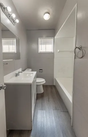 a bathroom with a sink and mirror