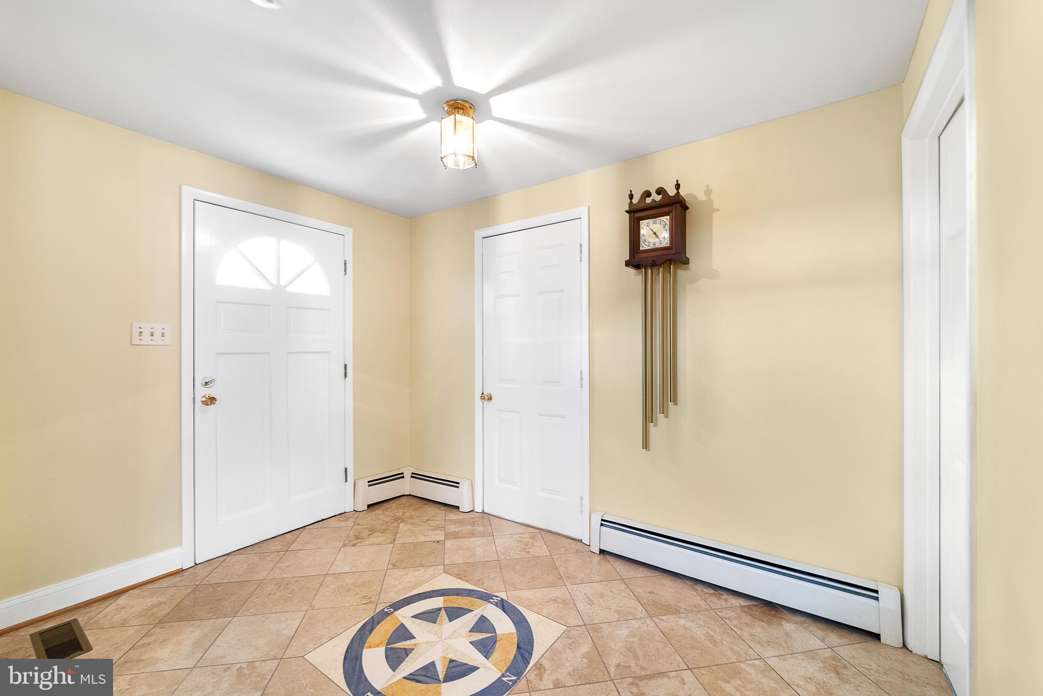 8149 Orchard Point Road Pasadena, MD 21122 - Photo 14 of 37 Foyer