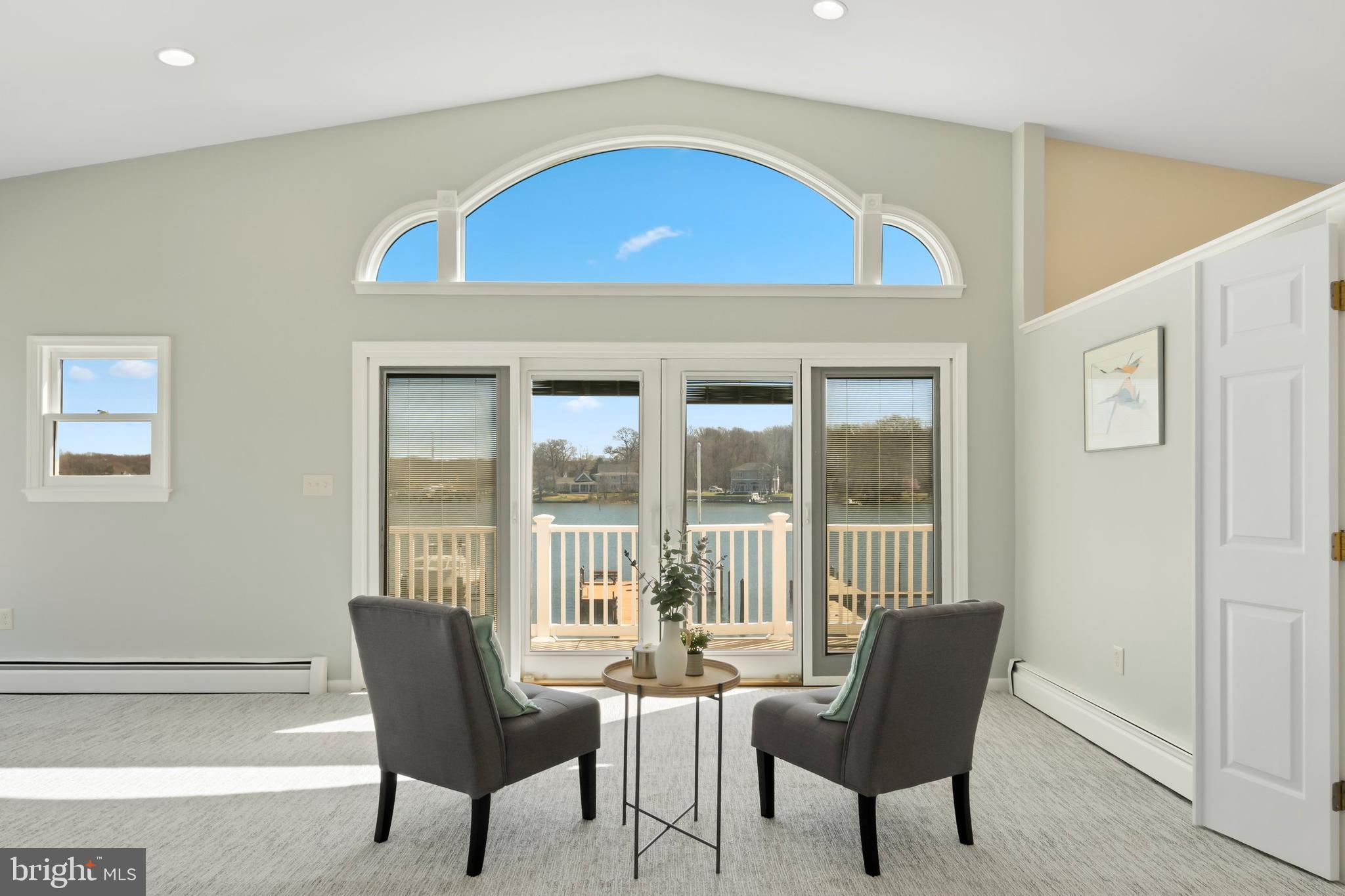 8149 Orchard Point Road Pasadena, MD 21122 - Photo 23 of 37 Primary Bedroom with sitting area and Balcony!