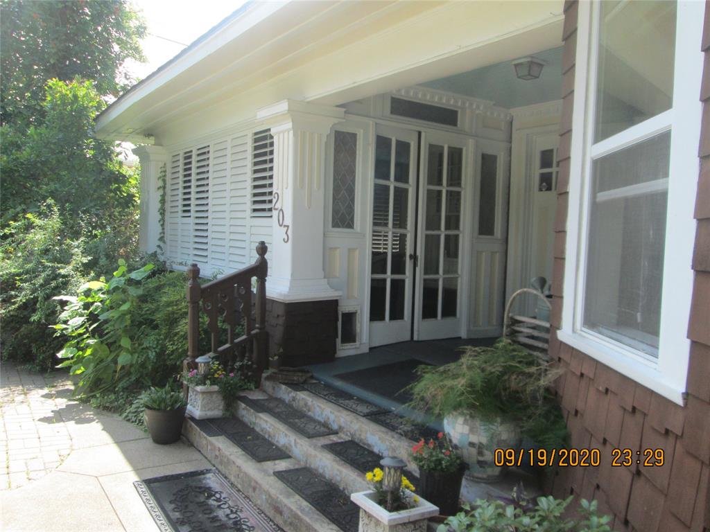 203 North Colson Street, Unit 4 Dallas, TX 75246 - Photo 2 of 15 View of exterior entry with french doors