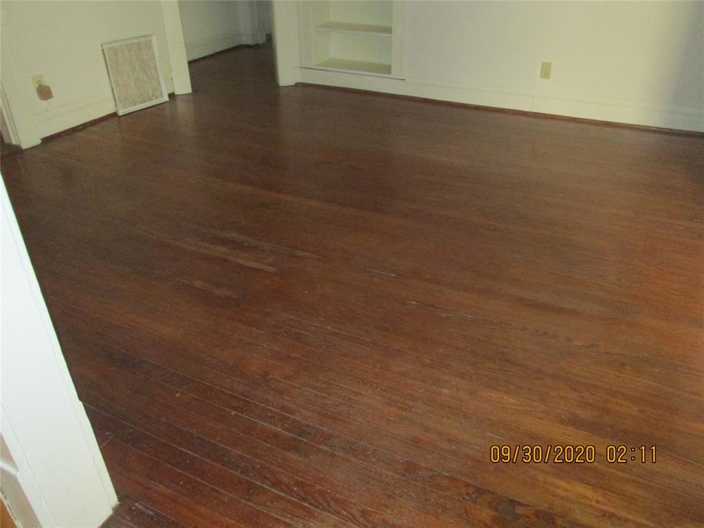 203 North Colson Street, Unit 4 Dallas, TX 75246 - Photo 8 of 15 Detailed view of wood finished floors and built in features