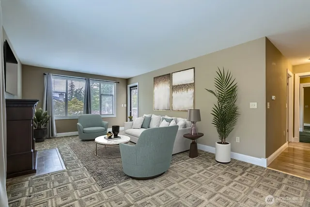 a kitchen with a stove a sink and a microwave