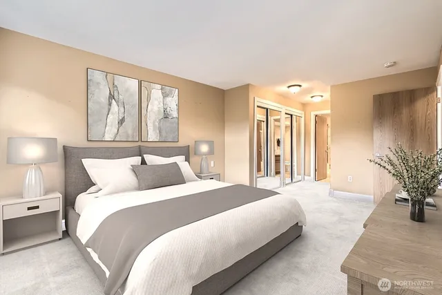 a bathroom with a granite countertop sink a mirror a bathtub and shower