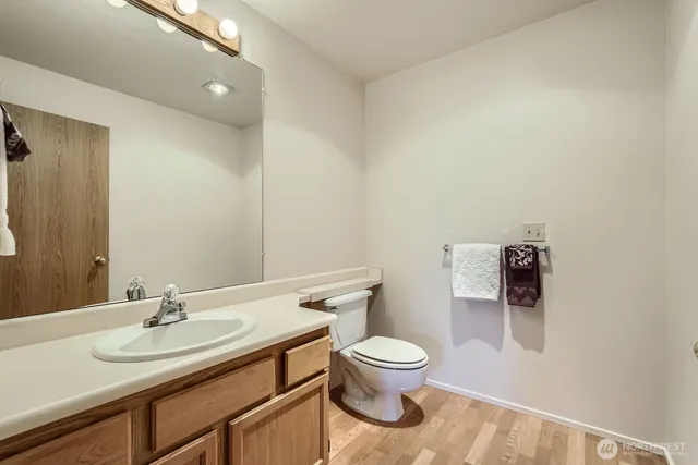 a bathroom with a toilet and a sink