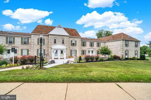 1000 # 15 Country Club Road York, PA 17403 - Photo 13 of 20 Charming stone facade with lush gardens.