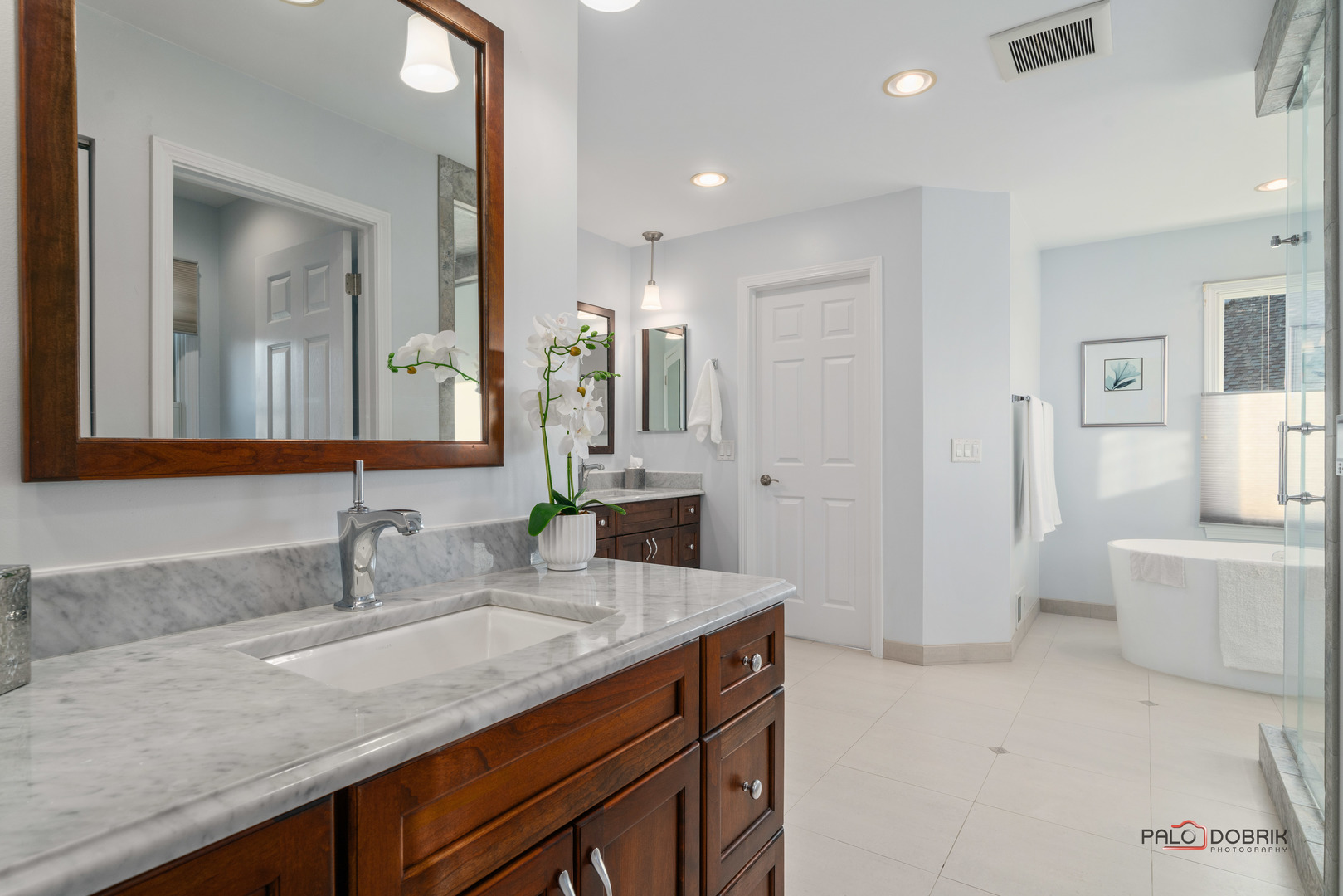 609 Raintree Road Buffalo Grove, IL 60089 - Photo 26 of 48 a bathroom with a granite countertop sink and a mirror