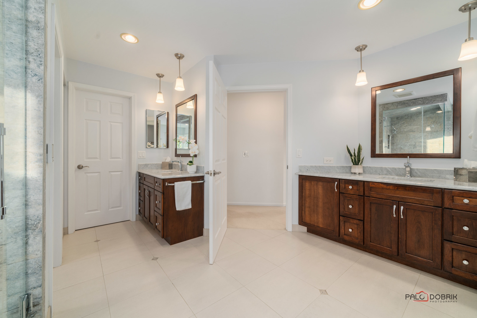 609 Raintree Road Buffalo Grove, IL 60089 - Photo 27 of 48 a bathroom with a sink double vanity and a mirror