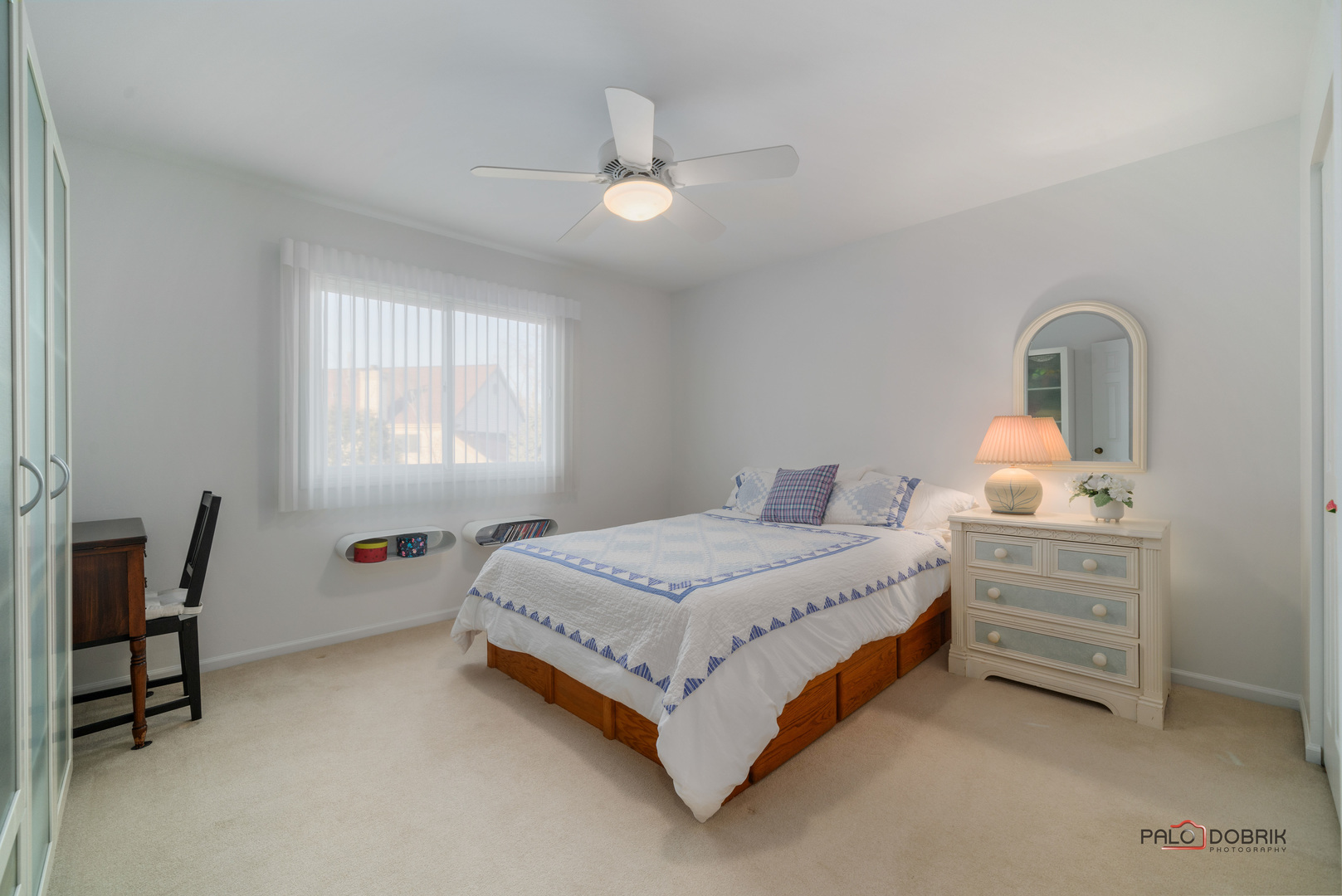 609 Raintree Road Buffalo Grove, IL 60089 - Photo 29 of 48 a bedroom with a bed chair and window