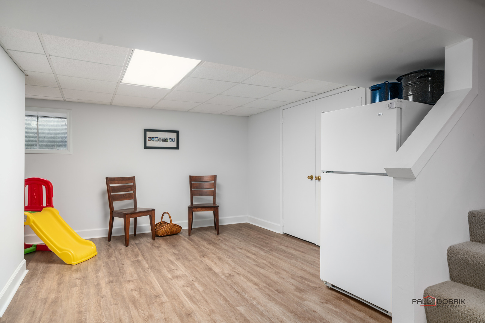 609 Raintree Road Buffalo Grove, IL 60089 - Photo 38 of 48 a view of a room with wooden floor and furniture