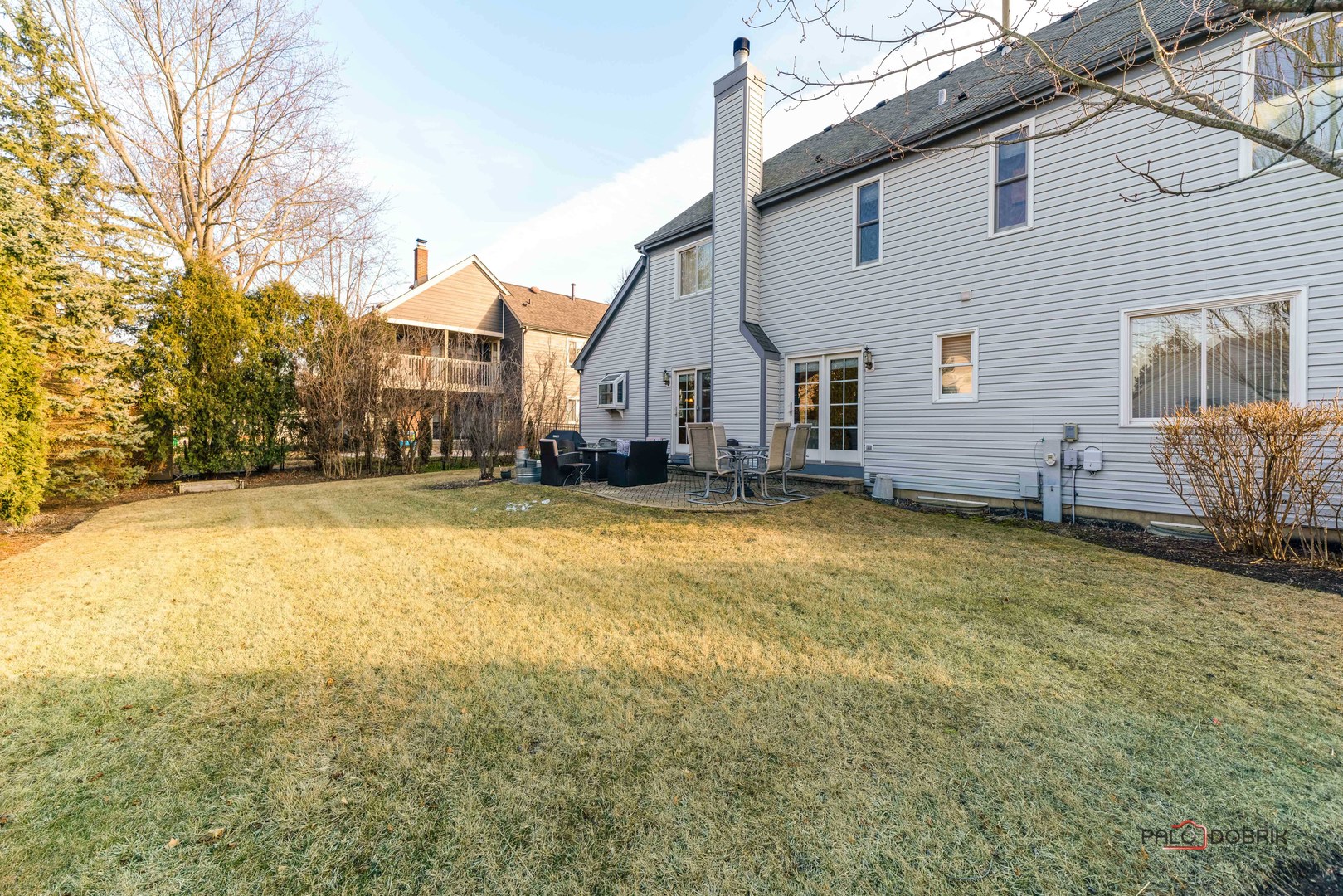 609 Raintree Road Buffalo Grove, IL 60089 - Photo 43 of 48 a view of a house with a yard