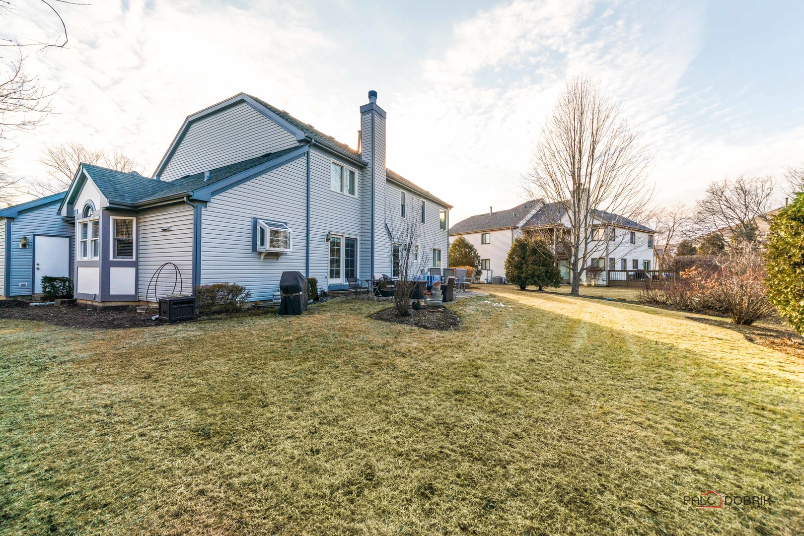 609 Raintree Road Buffalo Grove, IL 60089 - Photo 44 of 48 a view of a house with a yard