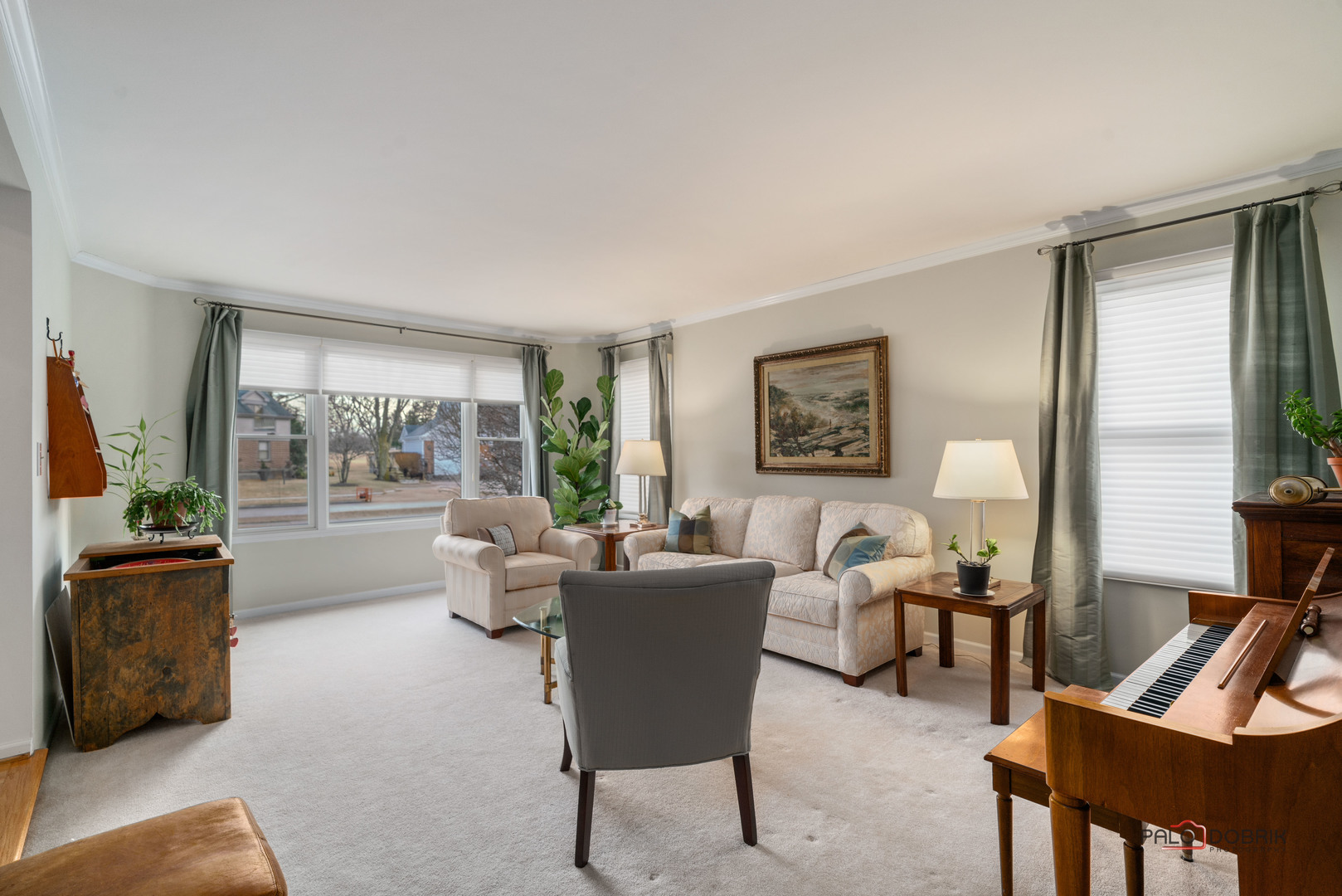 609 Raintree Road Buffalo Grove, IL 60089 - Photo 7 of 48 a living room with furniture and a large window