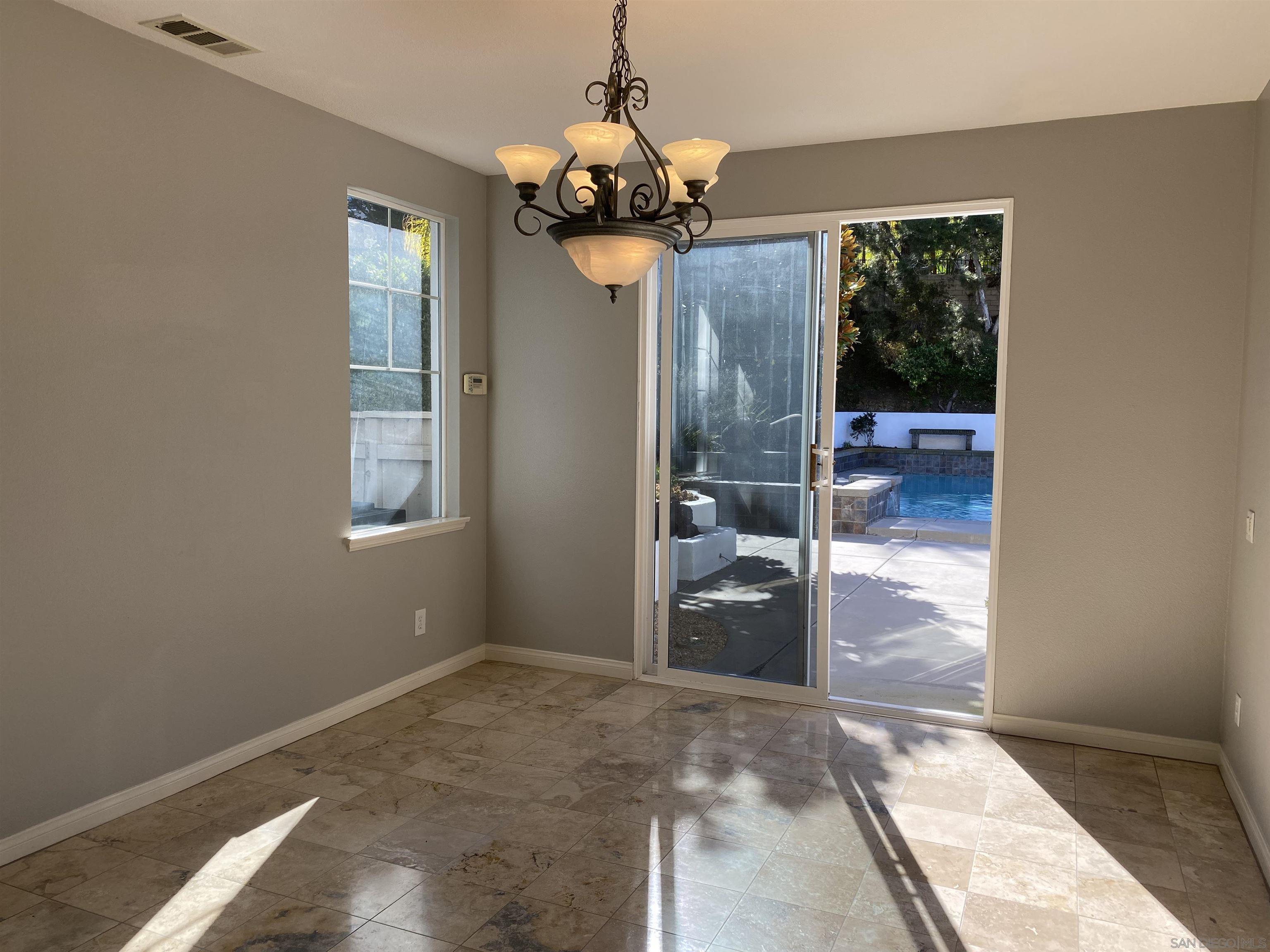513 Park Lane Encinitas, CA 92024 - Photo 14 of 41 a view of a livingroom with a chandelier