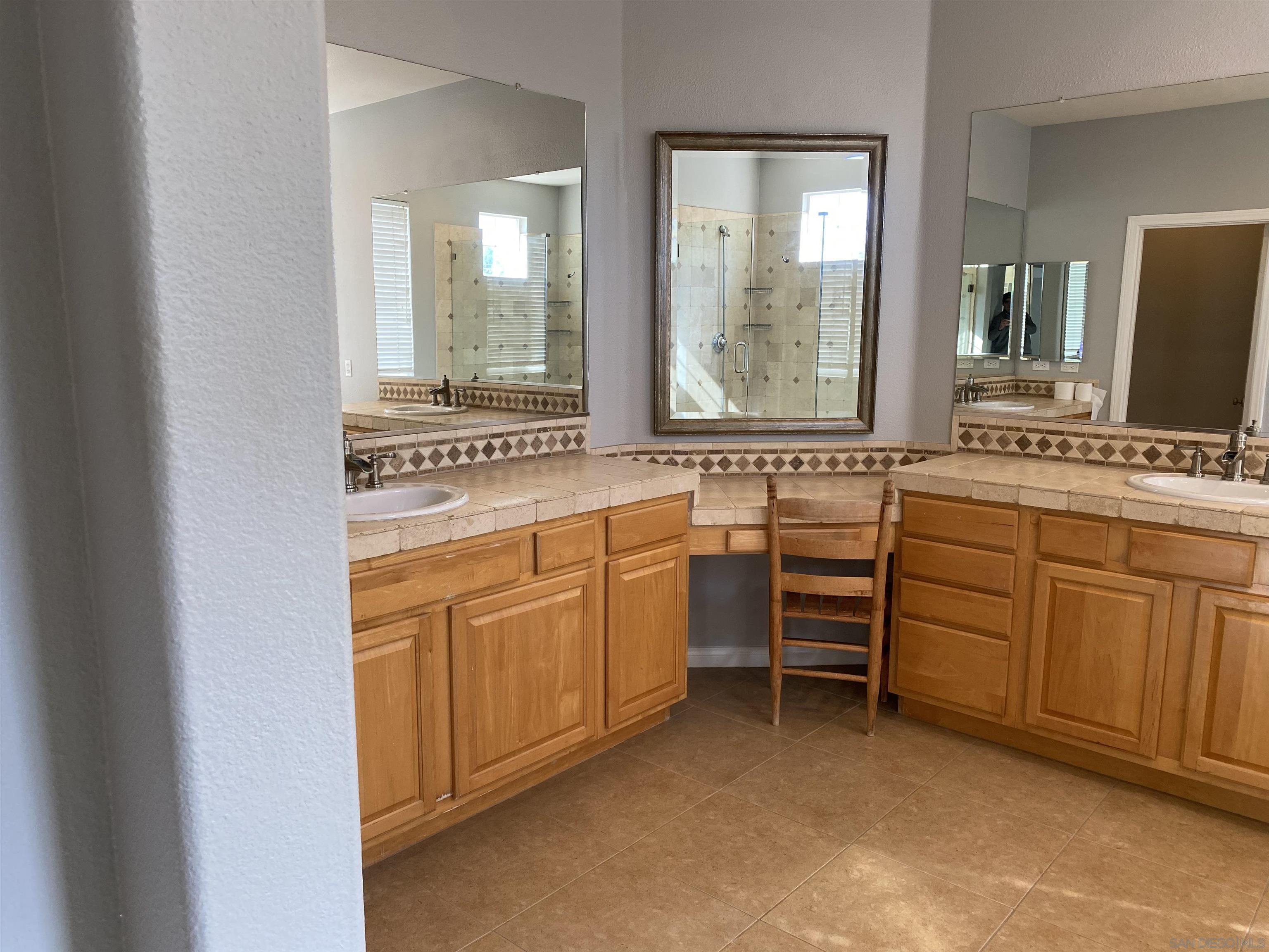 513 Park Lane Encinitas, CA 92024 - Photo 22 of 41 a view of a sink and dishwasher with wooden floor