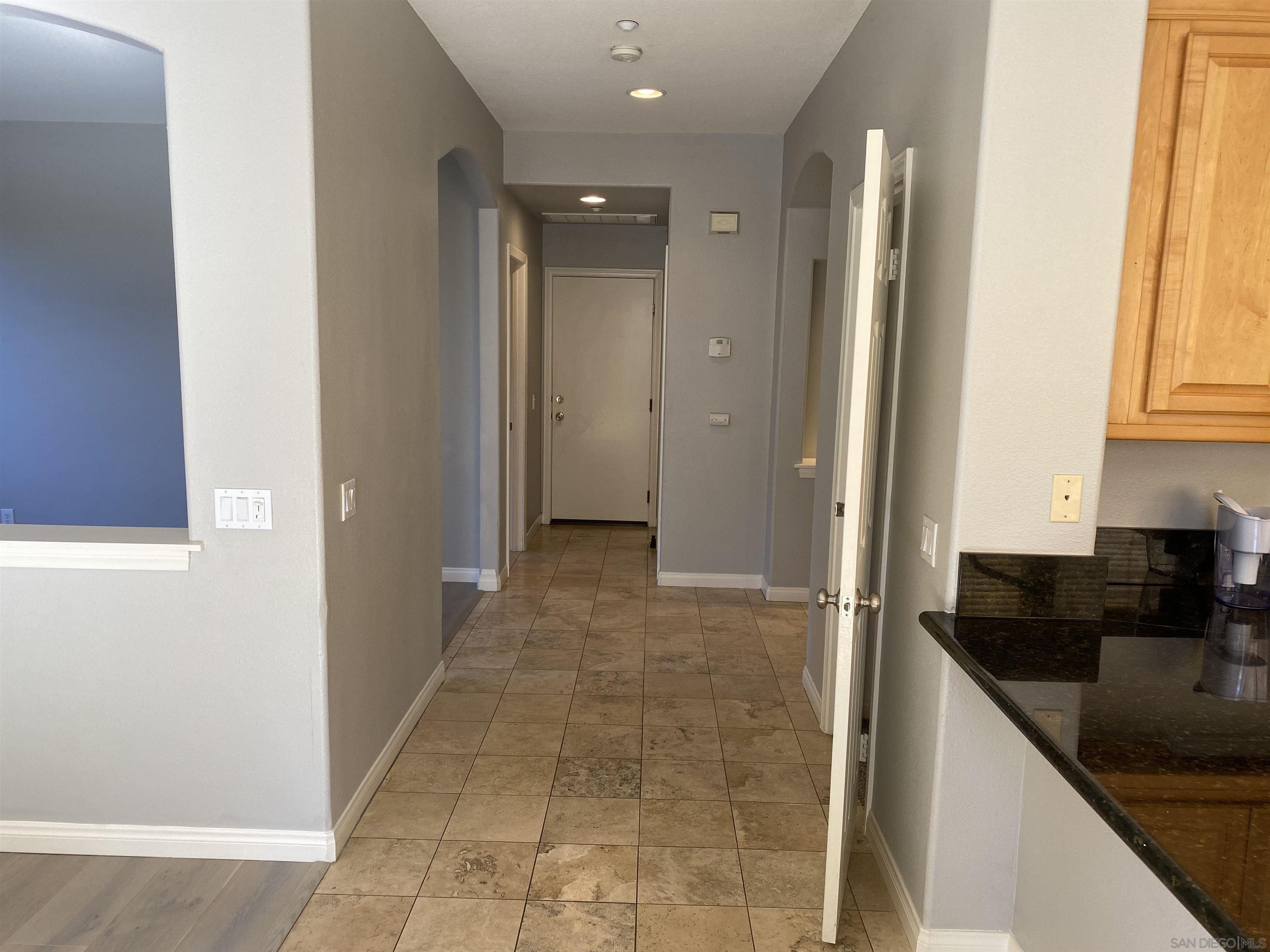 513 Park Lane Encinitas, CA 92024 - Photo 30 of 41 a view of a kitchen from the hallway