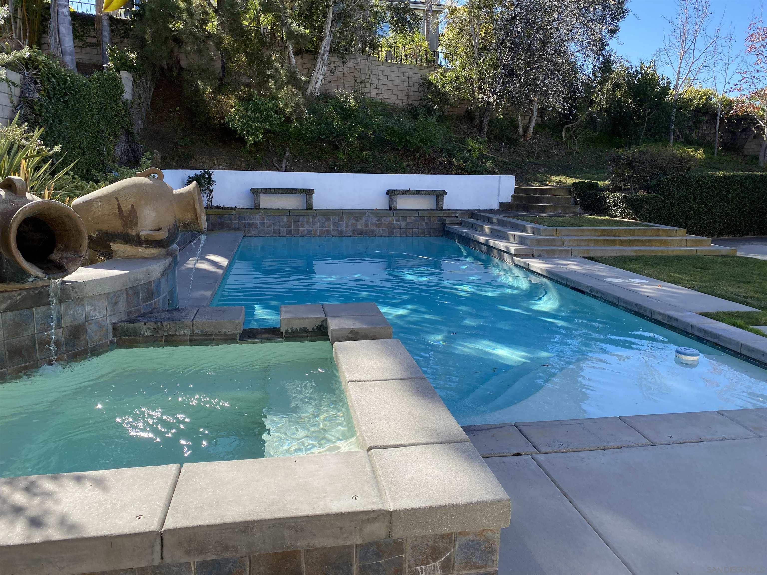 513 Park Lane Encinitas, CA 92024 - Photo 3 of 41 a view of backyard with swimming pool and outdoor seating