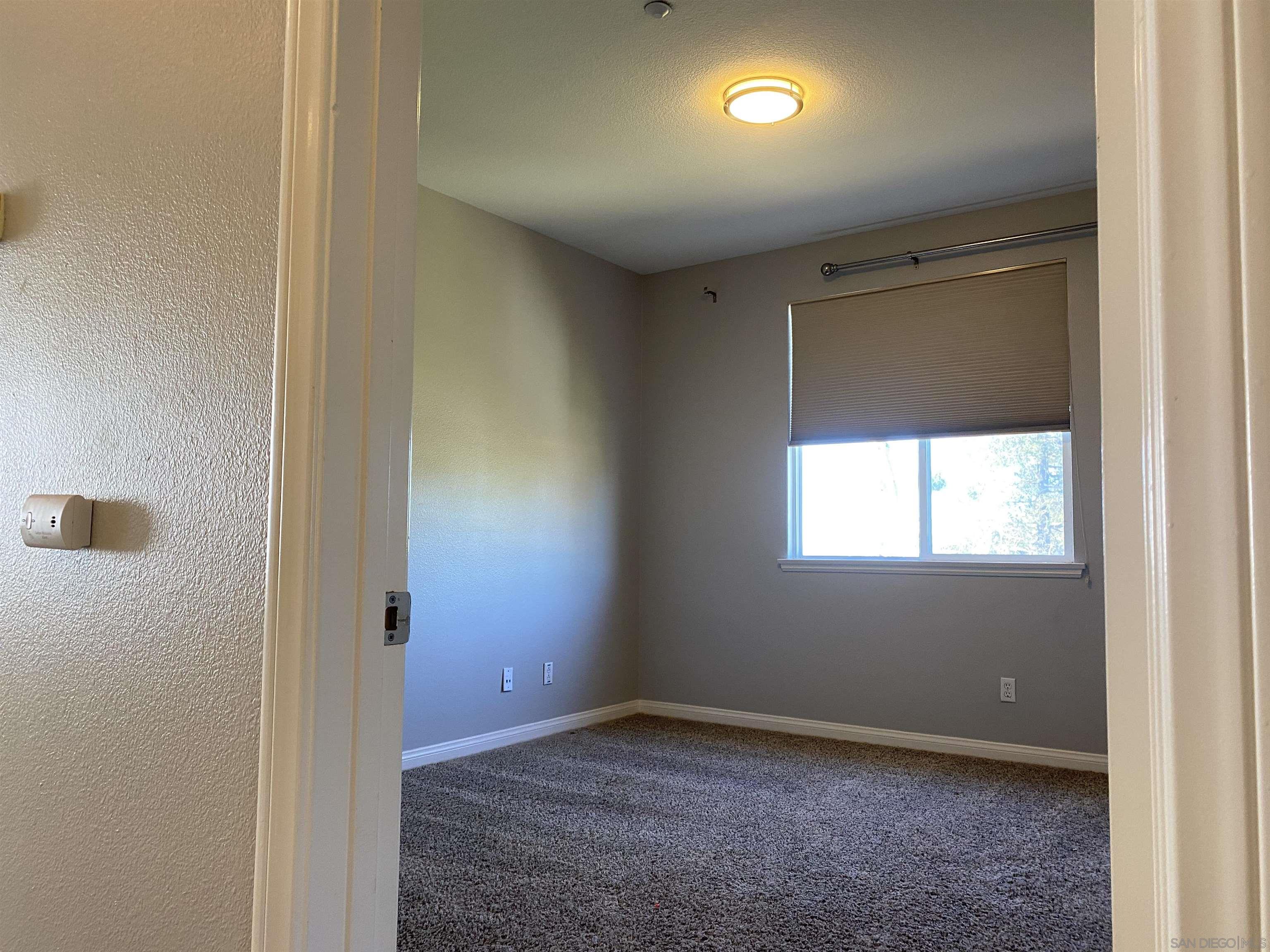 513 Park Lane Encinitas, CA 92024 - Photo 40 of 41 an empty room with a window