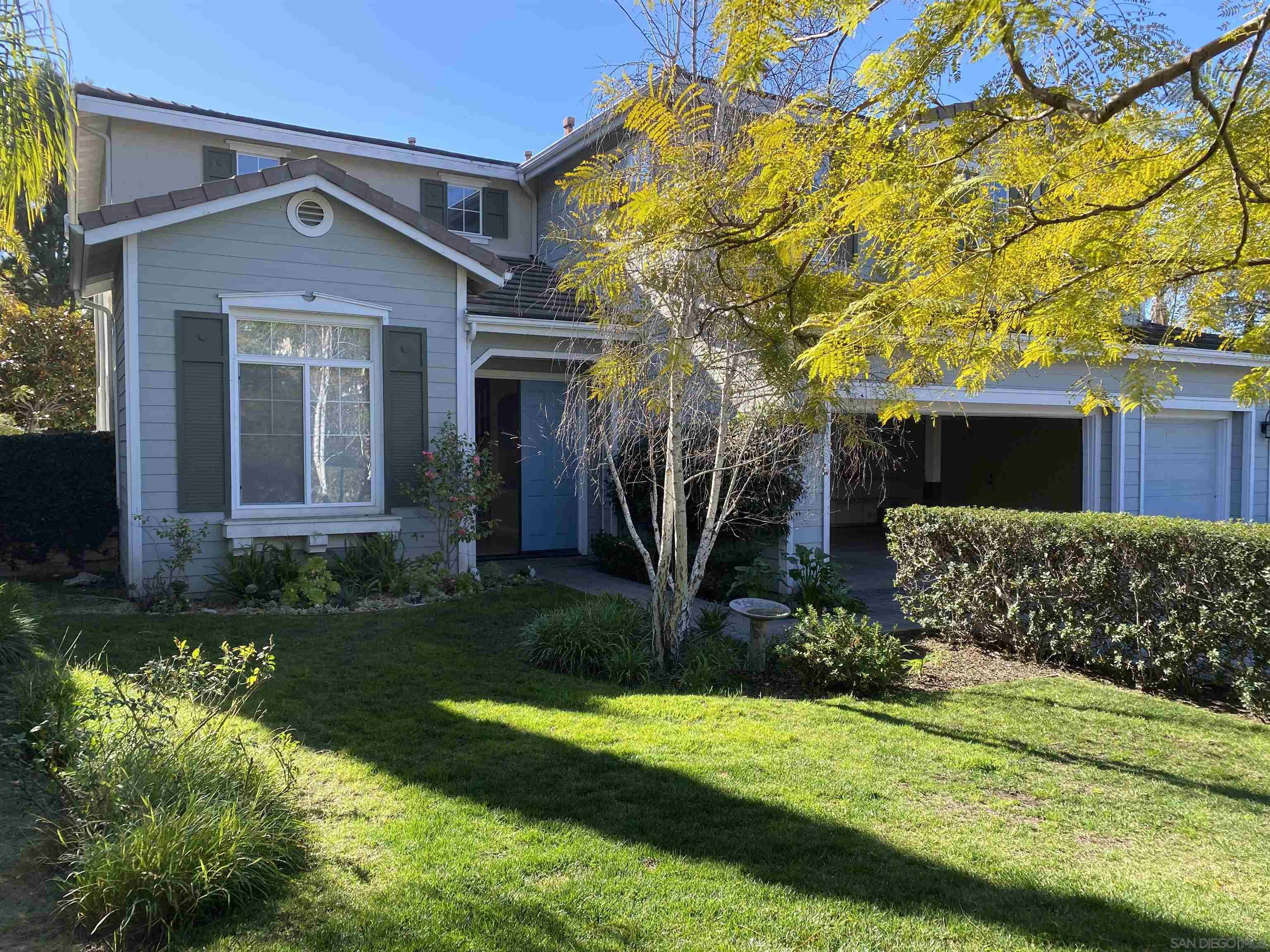 513 Park Lane Encinitas, CA 92024 - Photo 6 of 41 a front view of a house with garden