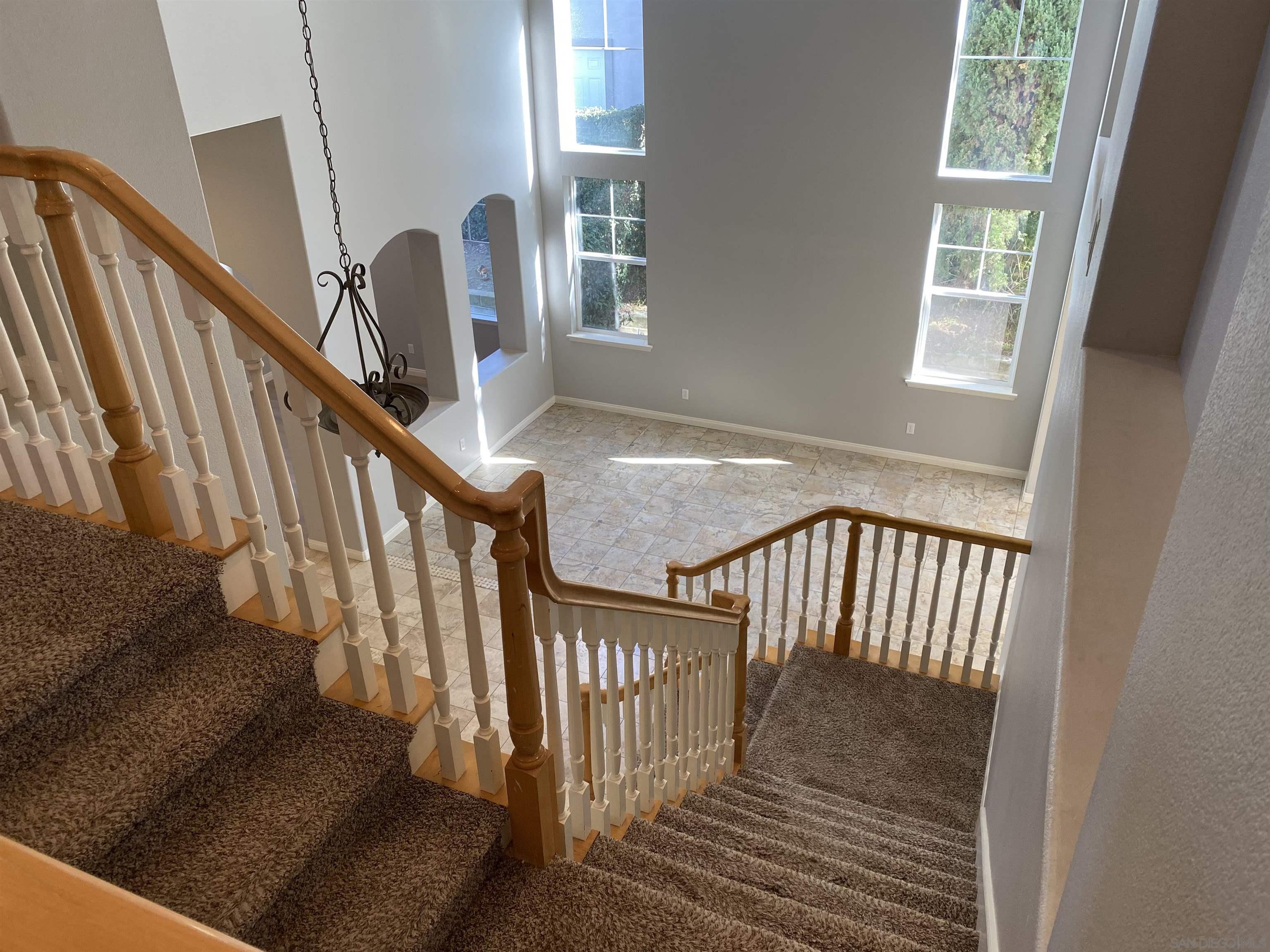 513 Park Lane Encinitas, CA 92024 - Photo 8 of 41 a view of entryway with wooden floor and stairs
