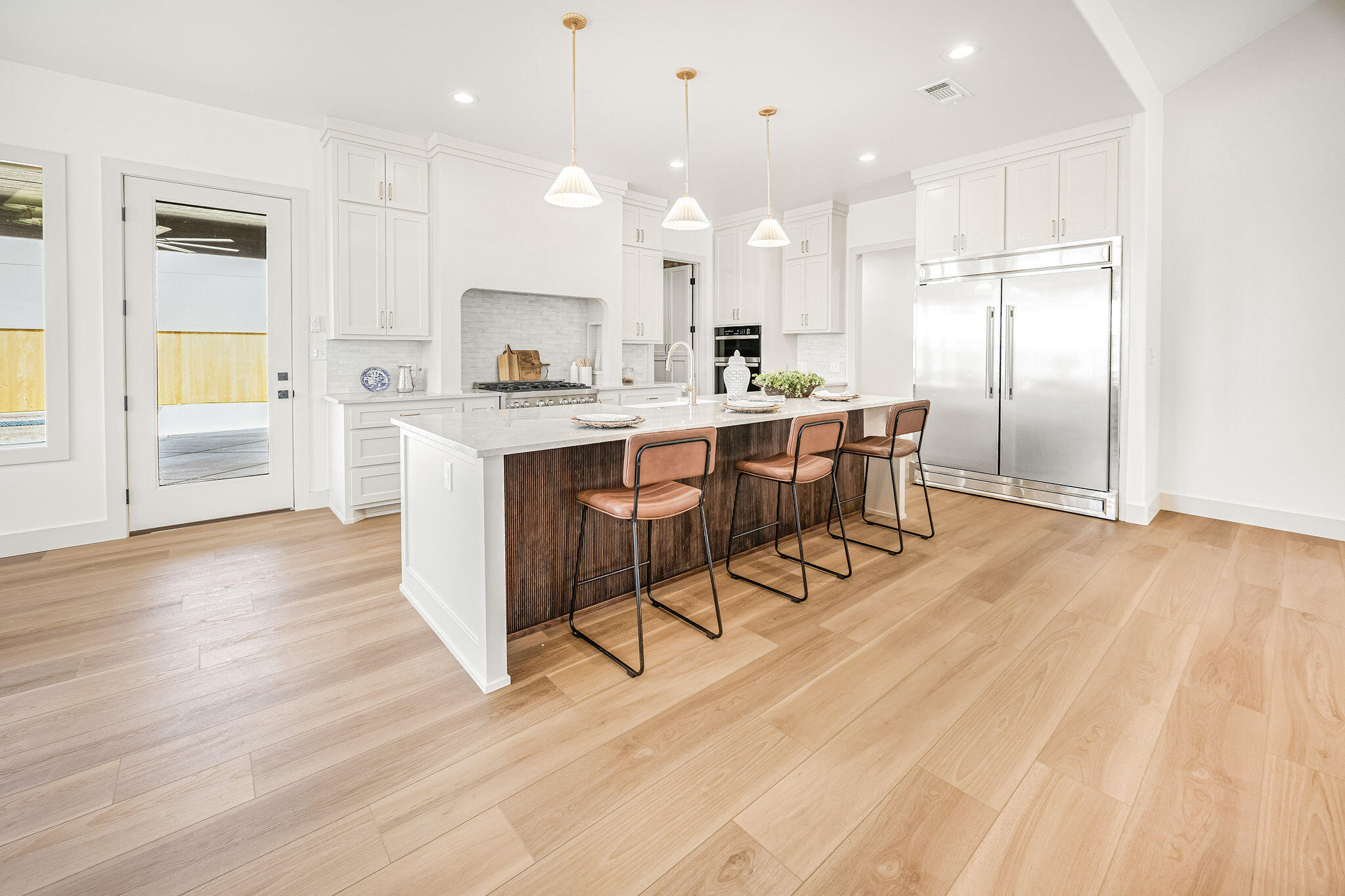4622 138th Place Lubbock, TX 79424 - Photo 15 of 48 a large kitchen with a table and chairs in it