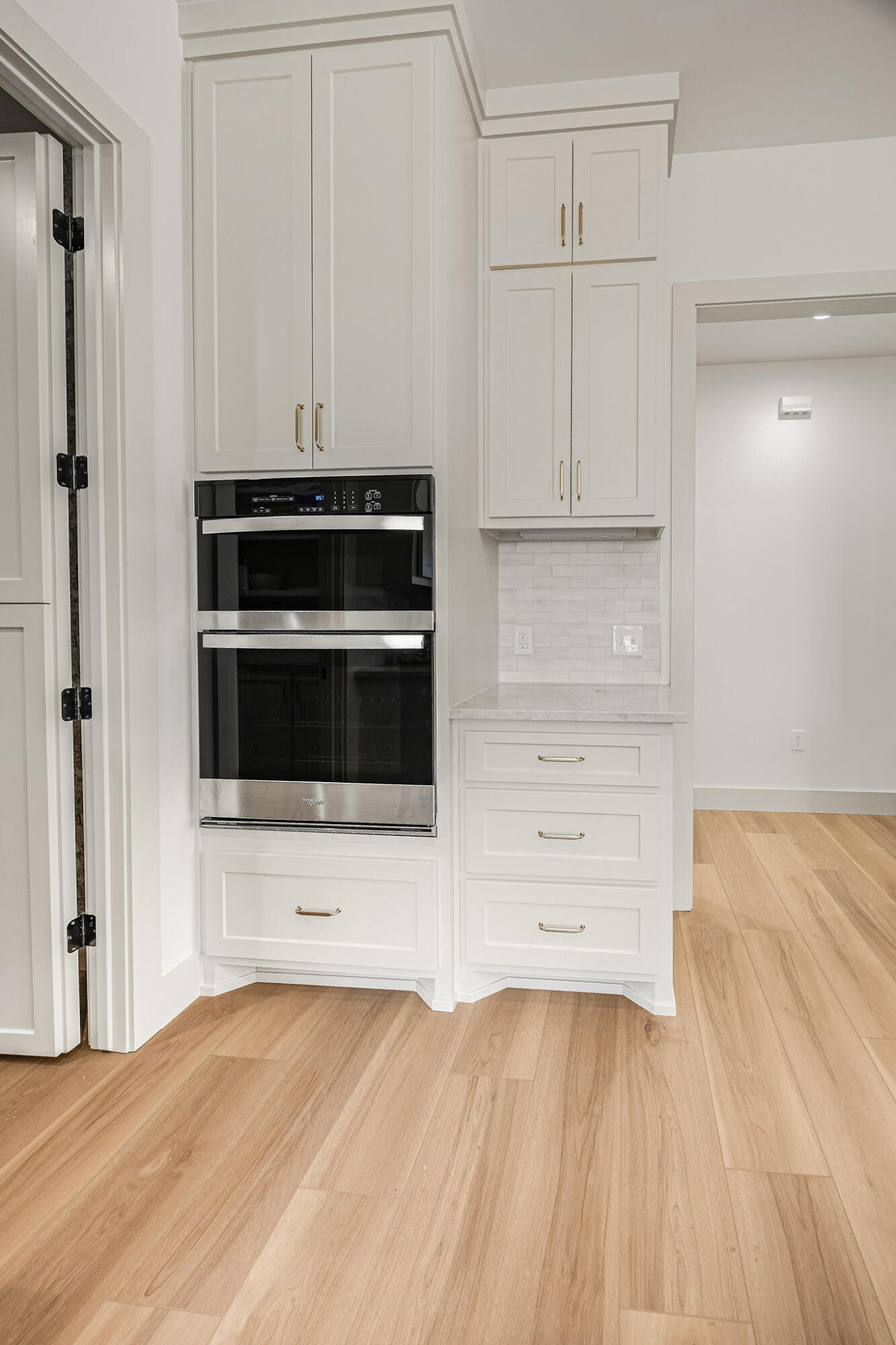 4622 138th Place Lubbock, TX 79424 - Photo 22 of 48 a kitchen with granite countertop white cabinets and stainless steel appliances
