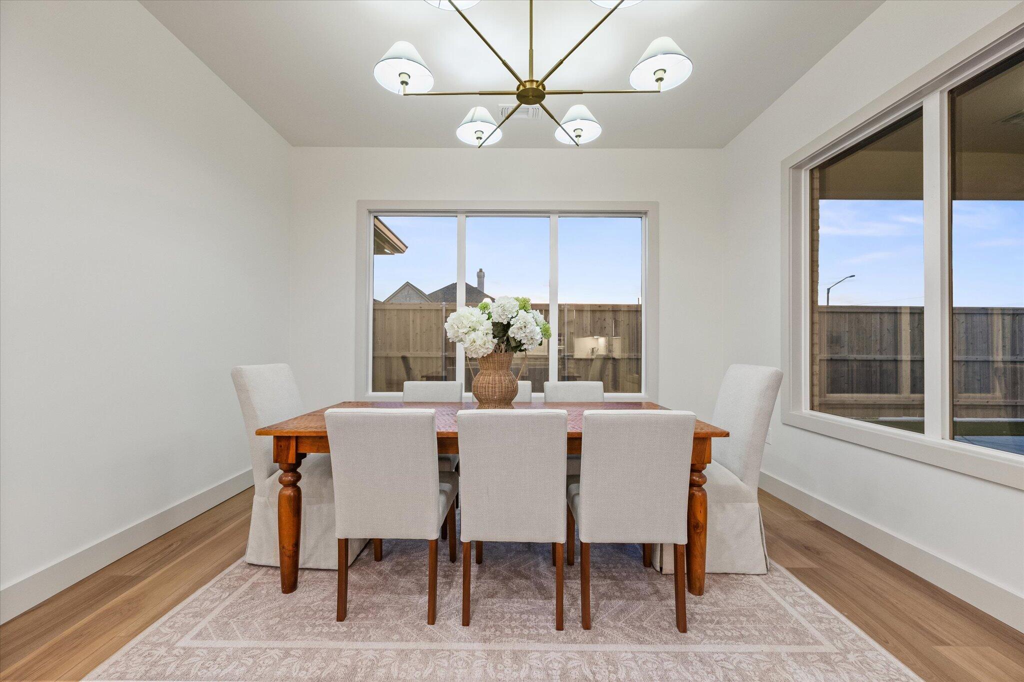 4622 138th Place Lubbock, TX 79424 - Photo 24 of 48 a dining room with furniture and window