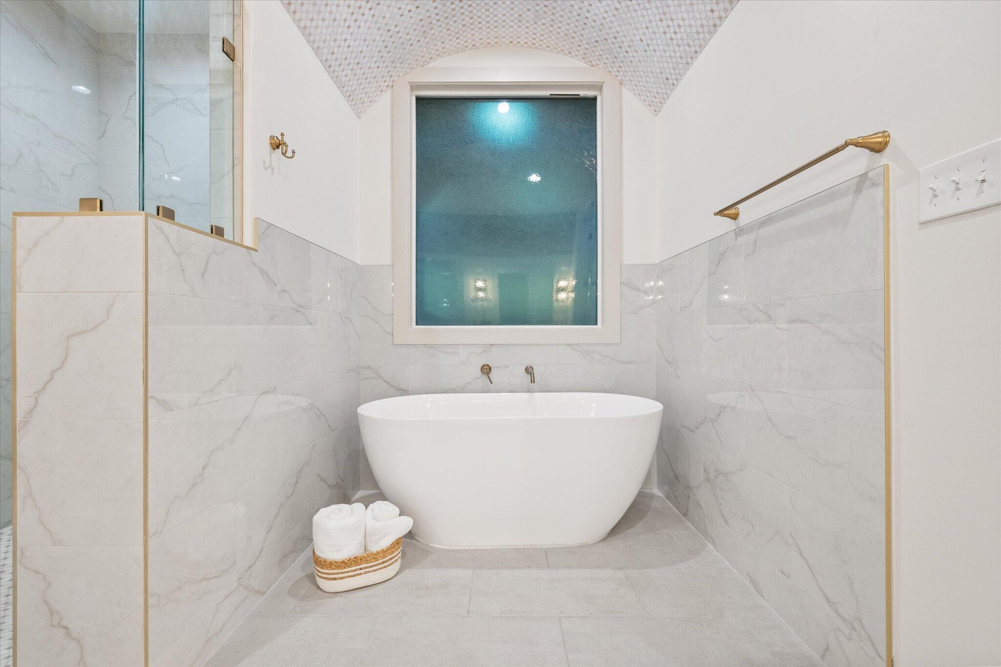 4622 138th Place Lubbock, TX 79424 - Photo 33 of 48 a bathroom with a bathtub and shower