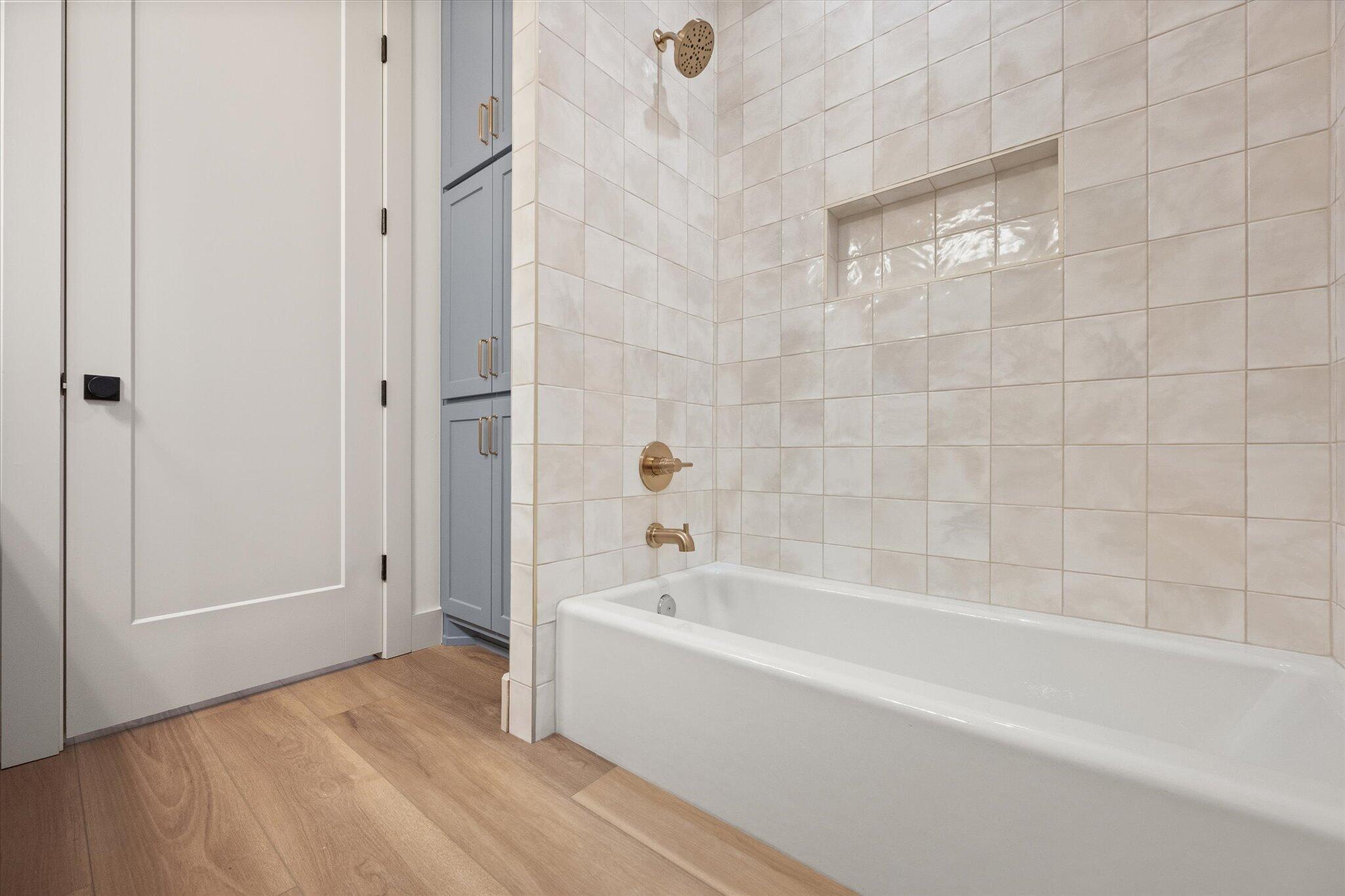 4622 138th Place Lubbock, TX 79424 - Photo 40 of 48 a bathroom with a bathtub and shower