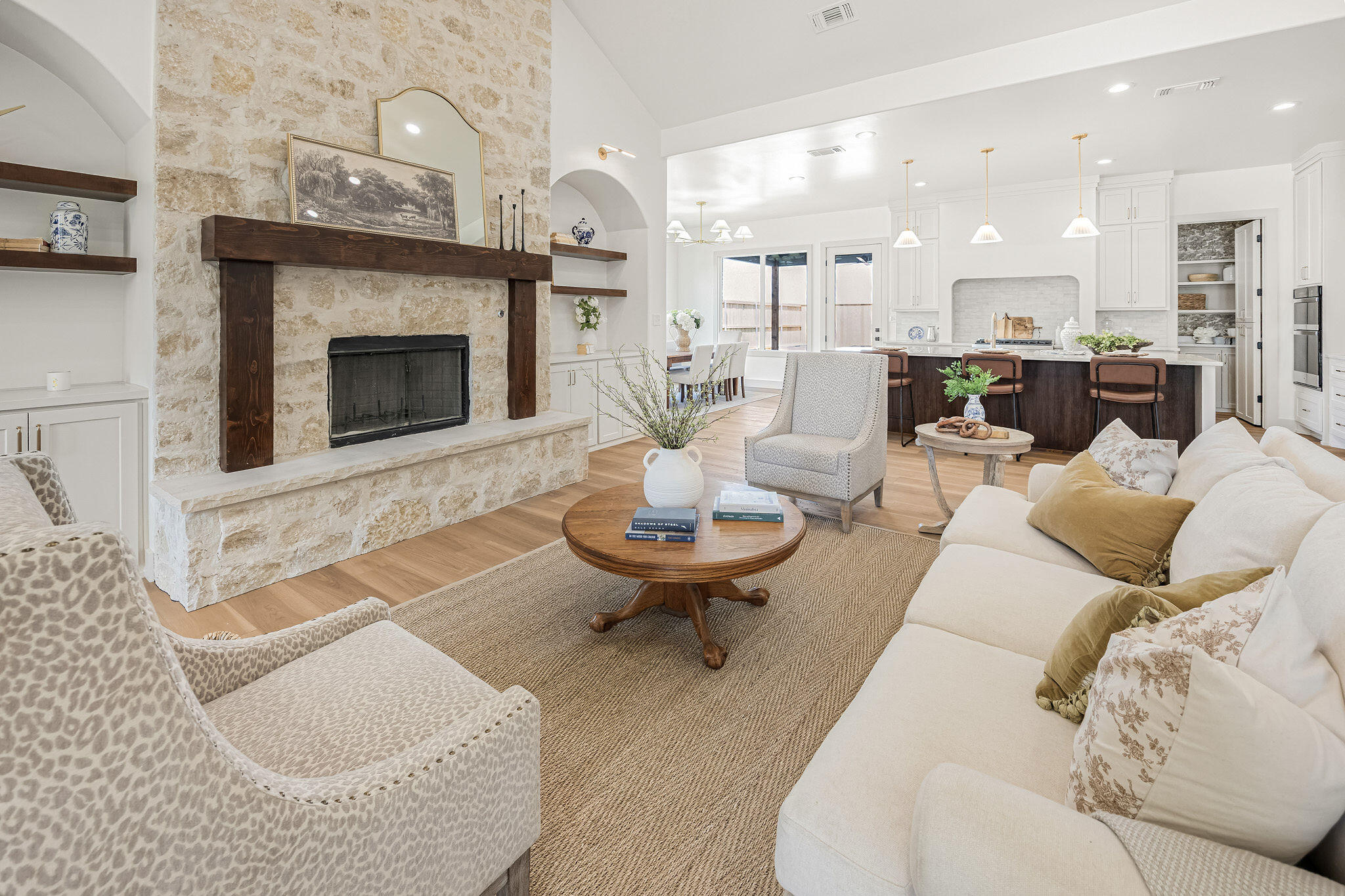 4622 138th Place Lubbock, TX 79424 - Photo 5 of 48 a living room with furniture a fireplace and a table