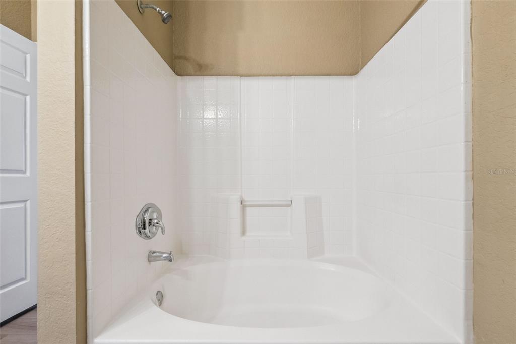 825 Grand Regency Point, Unit 103 Altamonte Springs, FL 32714 - Photo 11 of 20 a bathroom with a bathtub