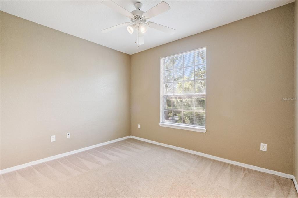 825 Grand Regency Point, Unit 103 Altamonte Springs, FL 32714 - Photo 18 of 20 a view of an empty room with a window