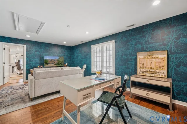 a living room with furniture and a table