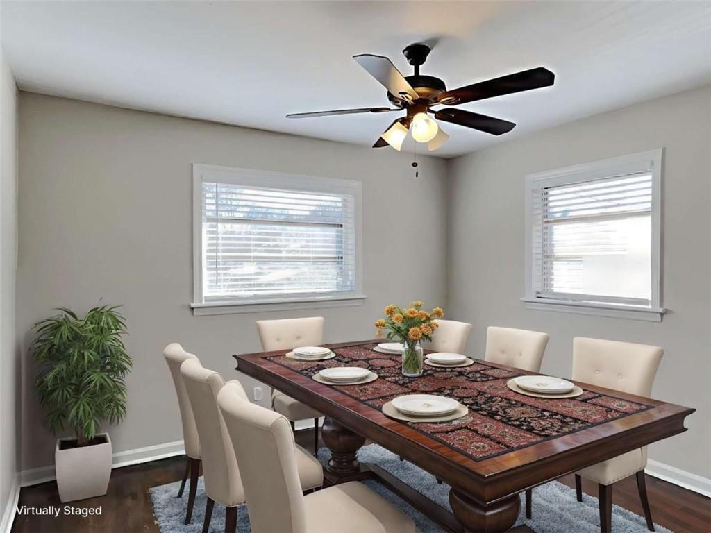 3148 Thrasher Circle Decatur, GA 30032 - Photo 4 of 20 a view of a dining room with furniture and a window
