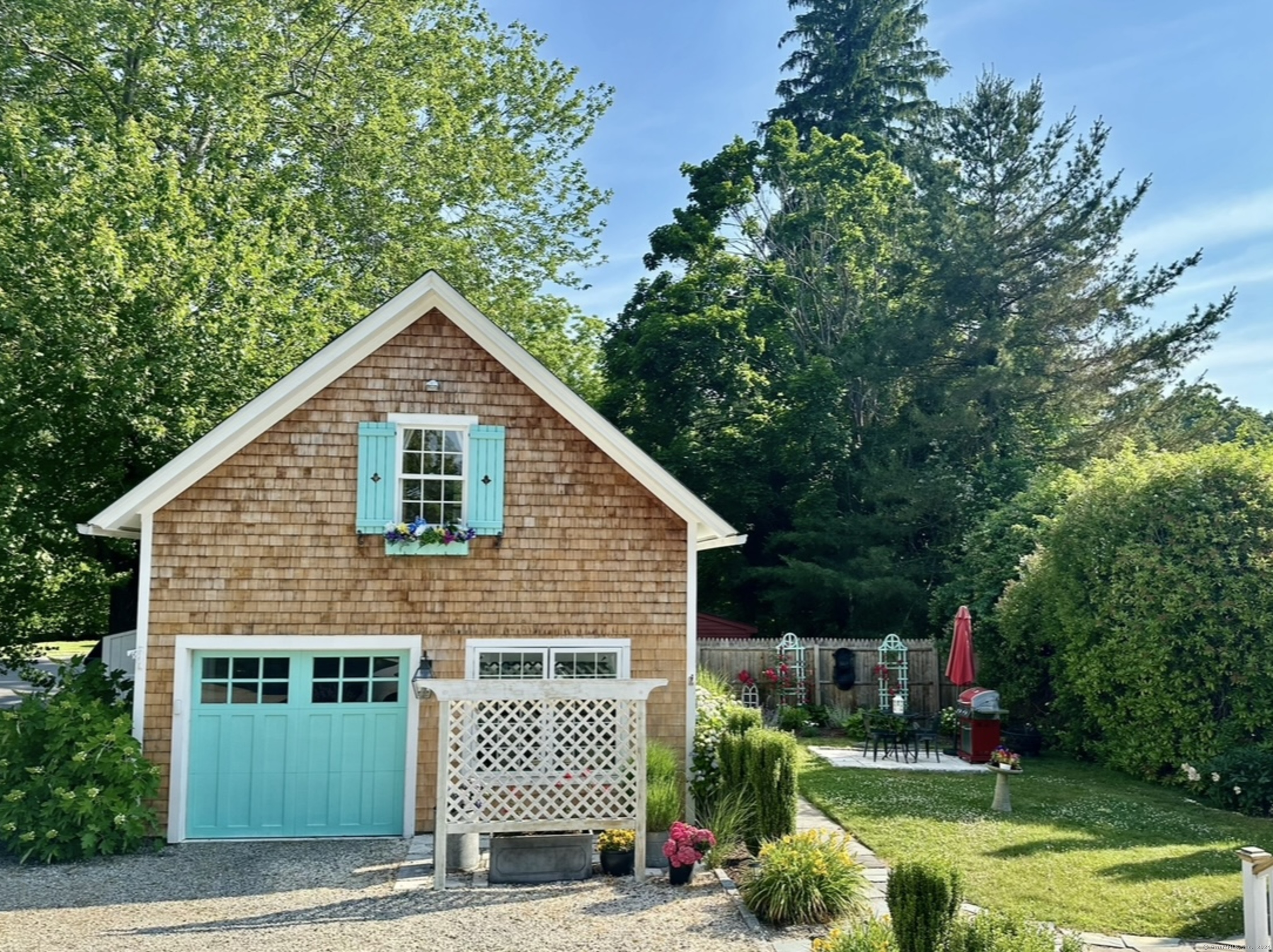 53 Liberty Street, Unit A Madison, CT 06443 - Photo 2 of 18 a view of a house with a yard